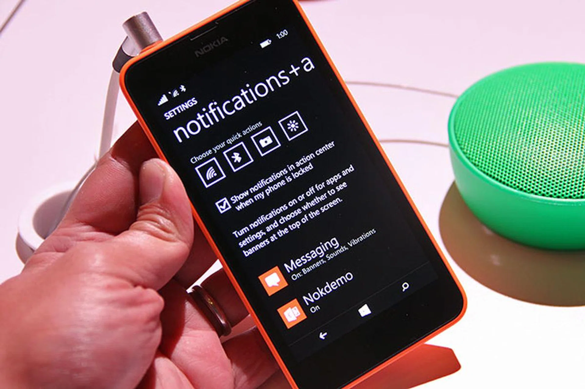 You can configure the quick action shortcuts and various notification parameters in the Notifications + Actions page in the Settings app.