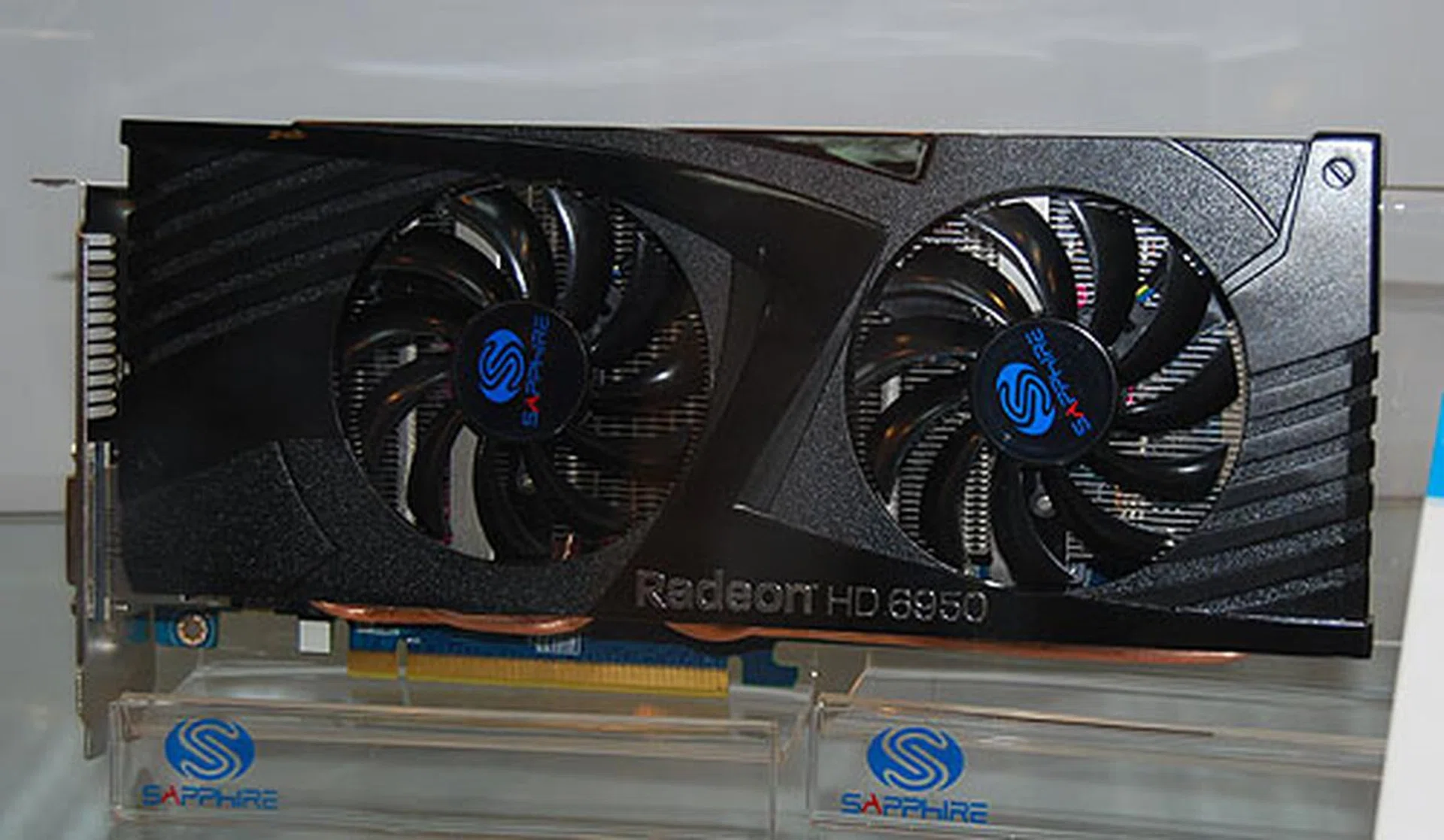 The Sapphire Radeon HD 6950 2GB Dirt Edition has a custom, dual-fan cooler design. It has a core clock of 800MHz and comes with 2GB of DDR5 memory. Of course, you'll also get a Dirt 3 coupon.