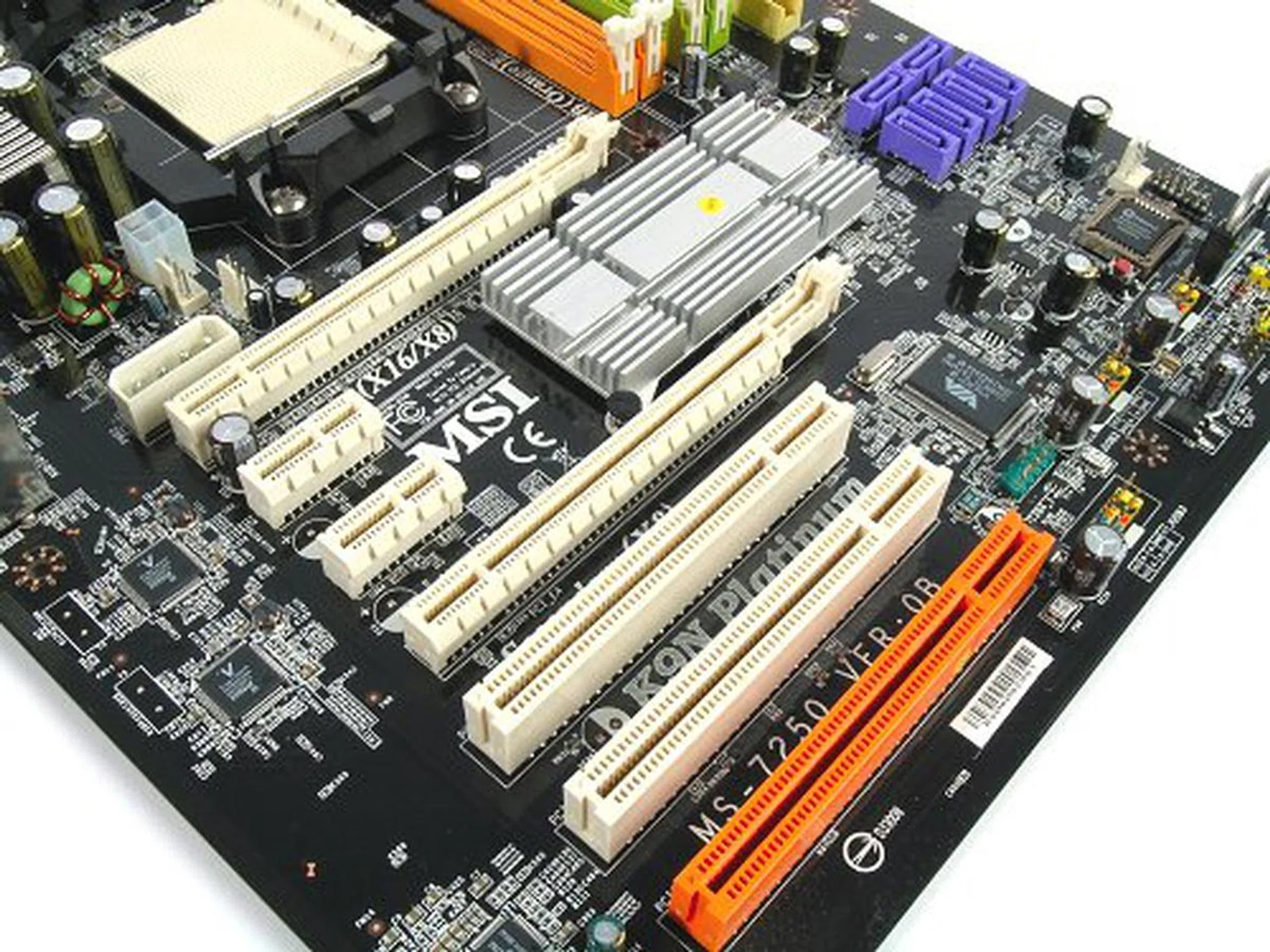 Rather standard expansion slot layout for an SLI or dual graphics enabled motherboard. Two full PCIe x16 slots, two PCIe x1 and three PCI, with the last orange one being MSI's souped up Communications Slot.