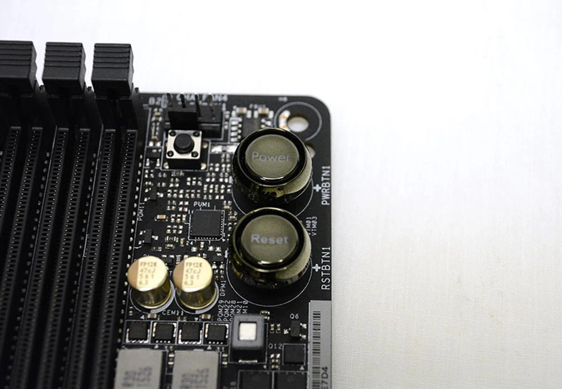 The power and reset buttons are located at the top right-hand corner of the board.
