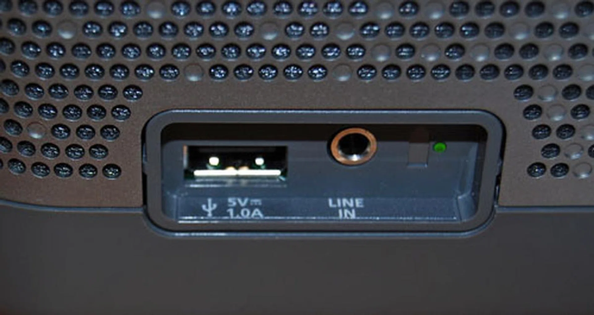 Recessed at the side are the USB port and the 3.5mm port along with the battery life indicator. Important to note is the fact that the USB port can charge the device you choose to plug in.