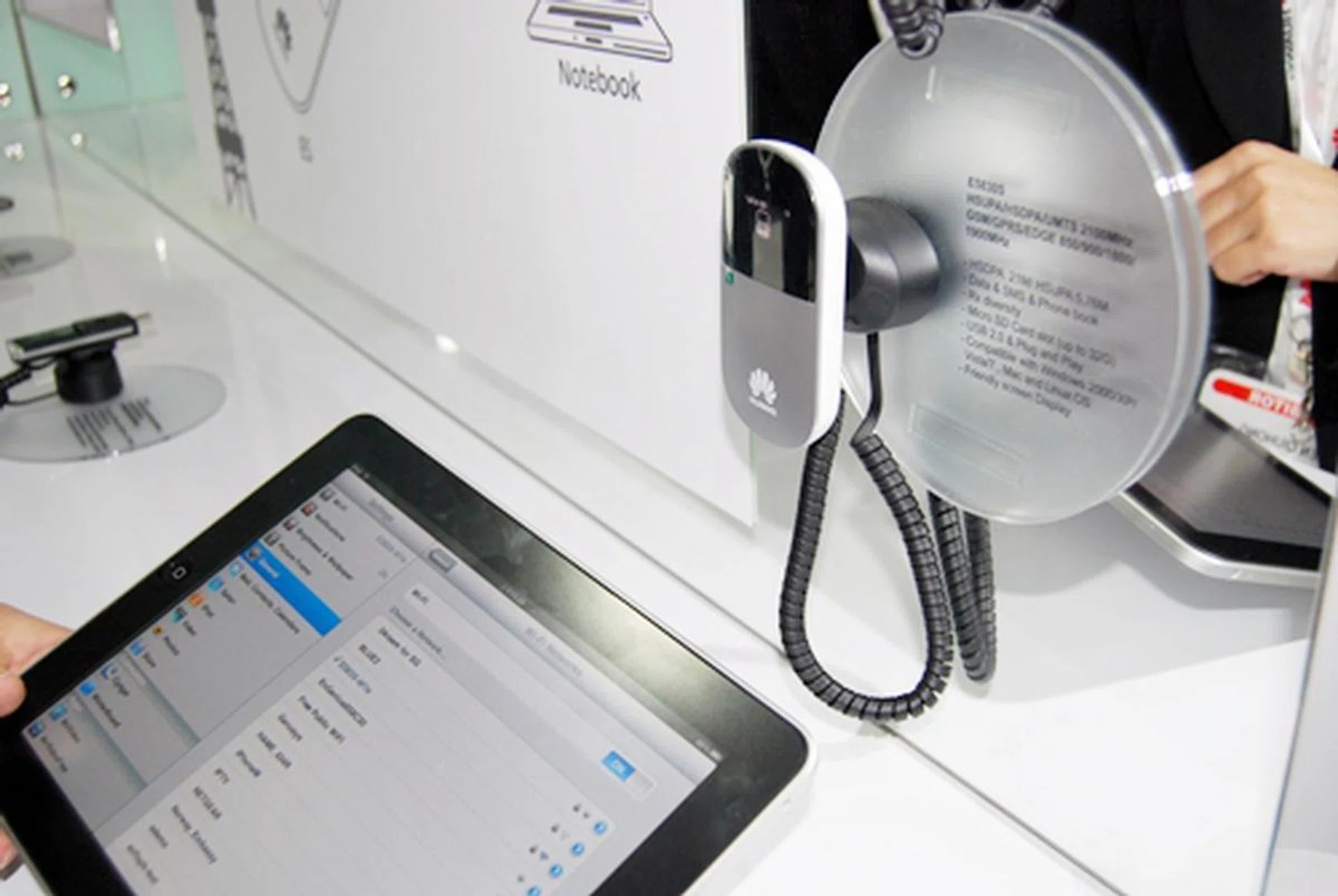 The E5830S 3G and WIFI dongle allows users to easily connect to wireless networks without having to, ironically, be connected physically. The device comes with a Micro SD Card slot (up to 32GB supported) that allows it to be used as a secondary flash drive. 