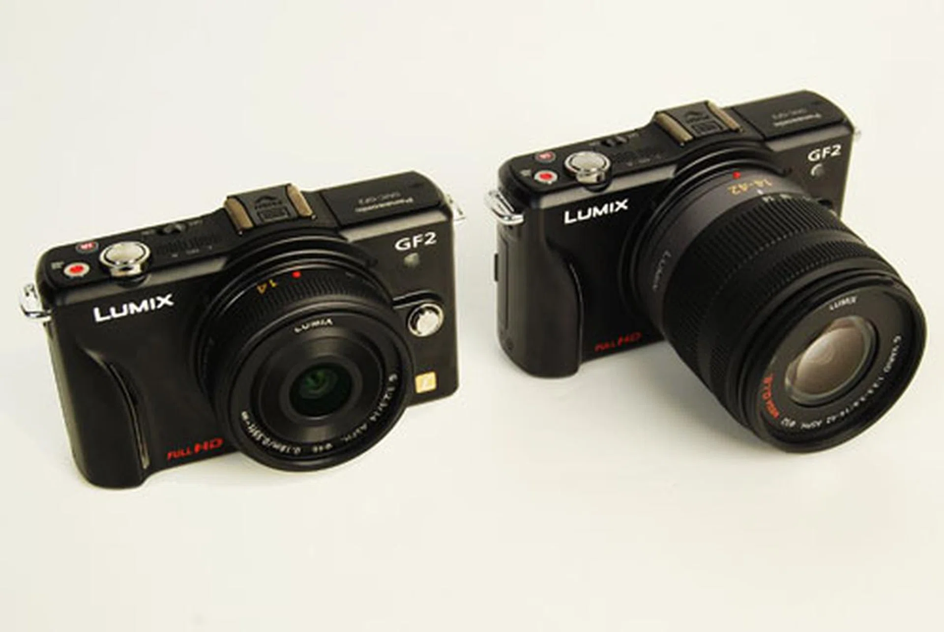 While the 14mm pancake (left) reduces the GF2's size and weight, we imagine more people will want to carry the 14-42mm (right) zoom lens for more versatile shooting needs.