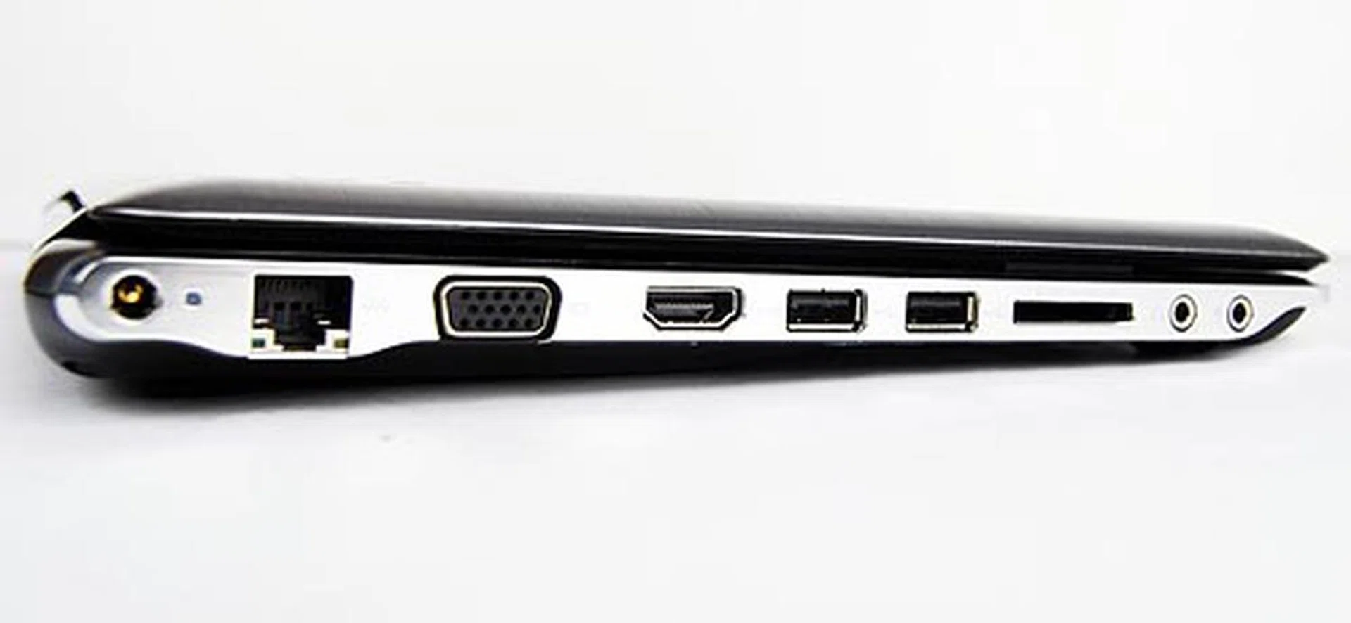 The left seems more cluttered with a LAN port, VGA, HDMI, dual USB ports, card reader and audio jacks.