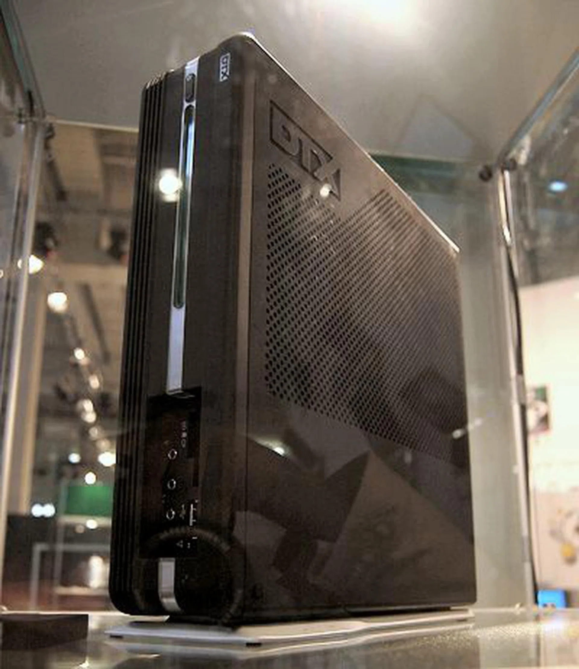  With BTX not being widely adopted (partly due to lack of Intel's own push) yet, AMD's recent studies of figures of the desktop shipment by form factors interestingly concluded that mini-towers are at the top the charts. It would seem normal towers are decreasing in appeal, giving way to a hike in demand for SFF and ultra-small SFF systems. Since the SFF market has no fixed design spec, AMD is marketing their DTX open standard spec for standardizing very slim and small form factor systems. We'll show you more of it soon from one of their partners helping to develop the casings (Chenbro), but here's a shot of how a typical DTX PC may look like.  