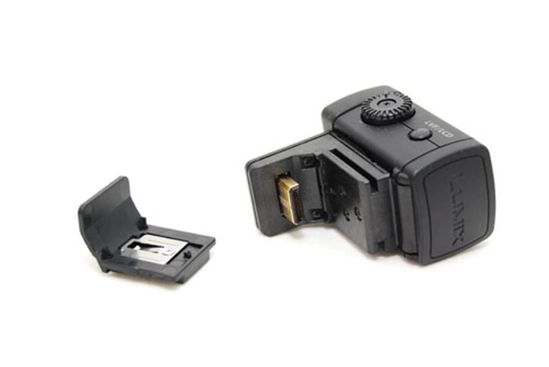 The hot shoe cover that comes with the GF1 (left) and the optional live view finder (right).