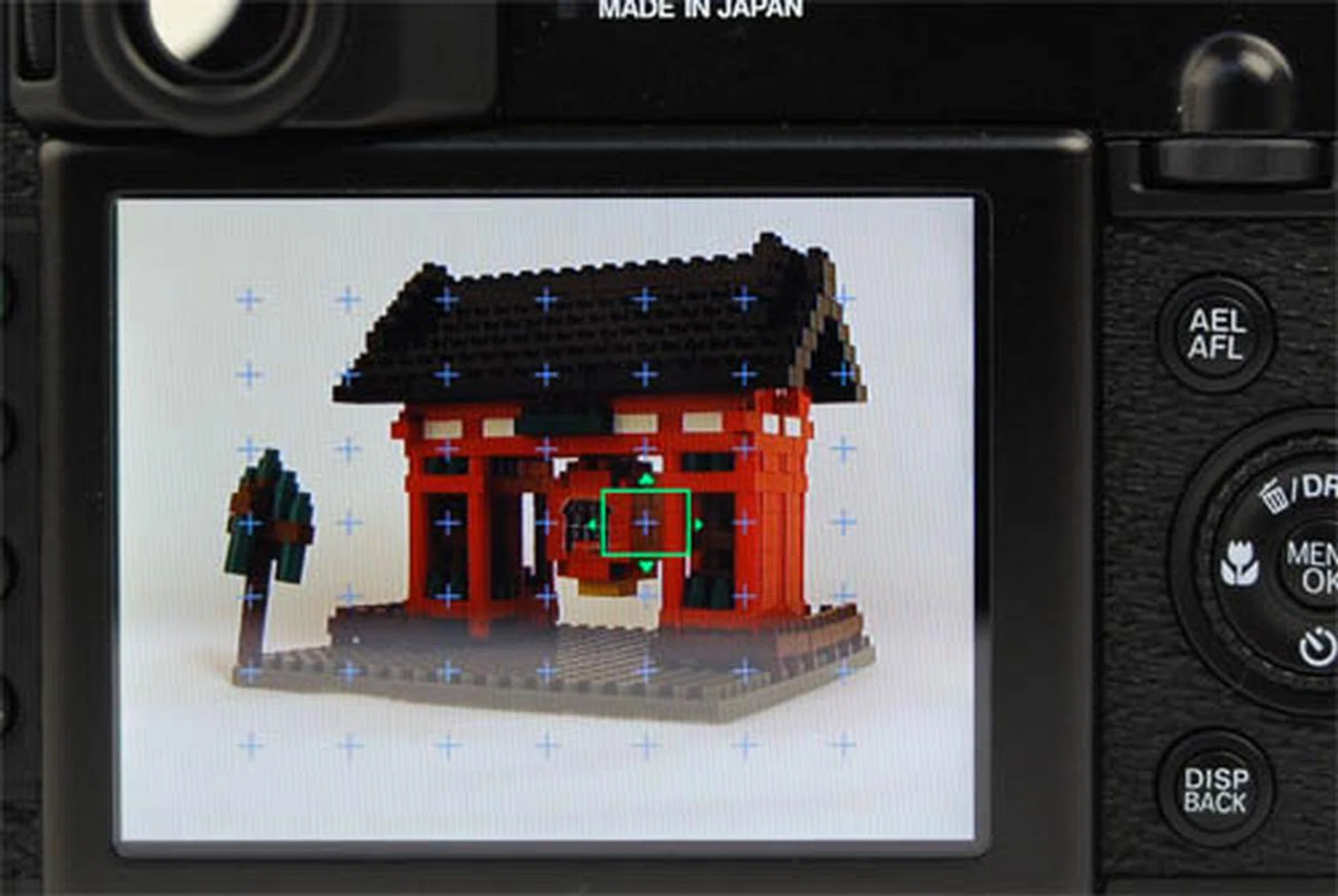 By holding down the AF button in AF-Area mode, you can determine your focal point manually using the scroll wheel or d-pad.