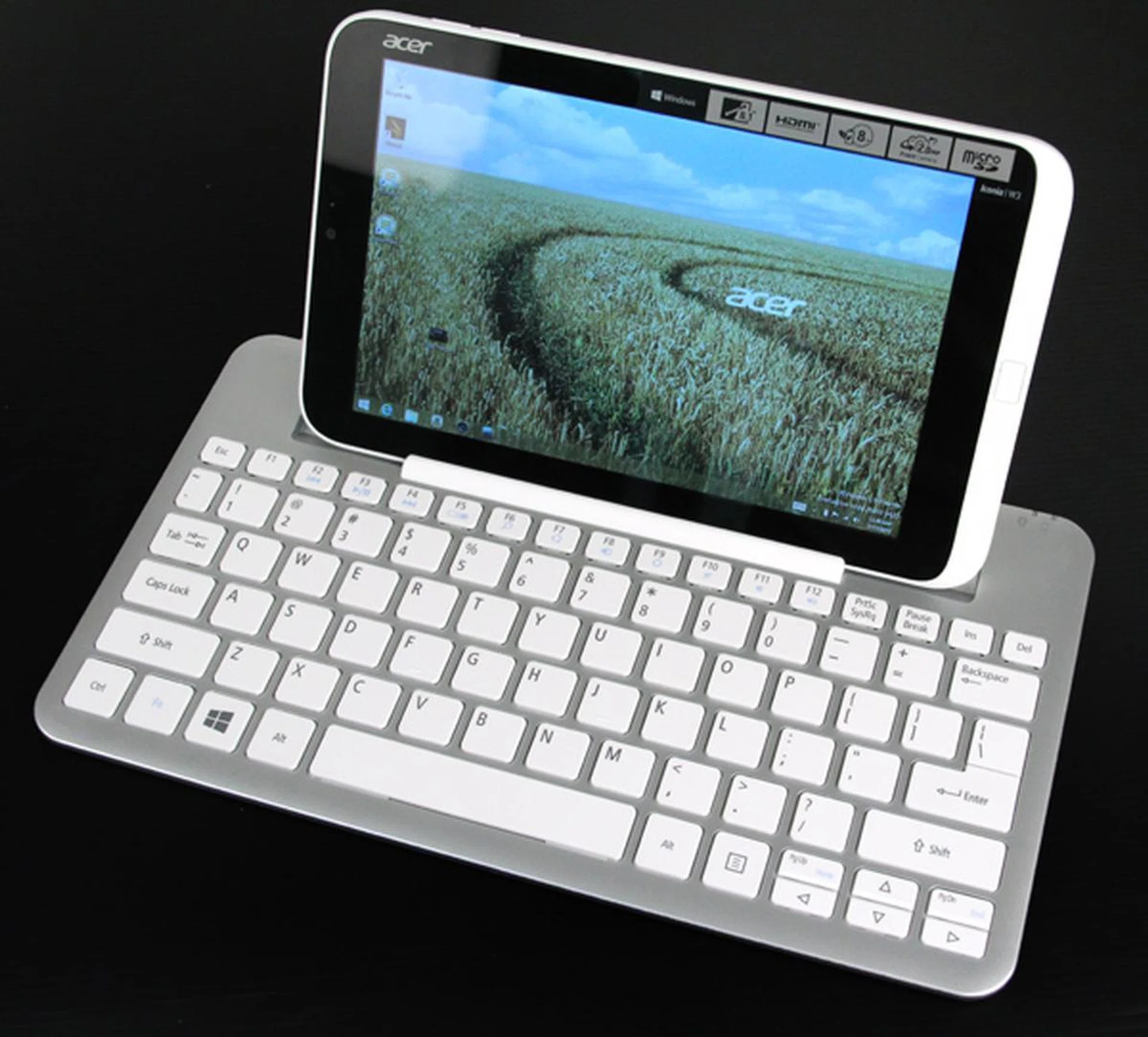 Despite being made for it, the W3's Bluetooth keyboard is strangely quite a bit larger than it, at about 11-inch long.
