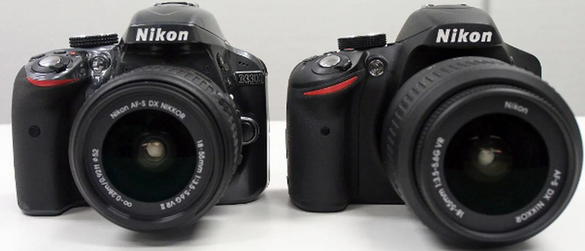 From the front, it's pretty obvious the new kit lens on the D3300 (left) is smaller than older model found on the D3200 (right).