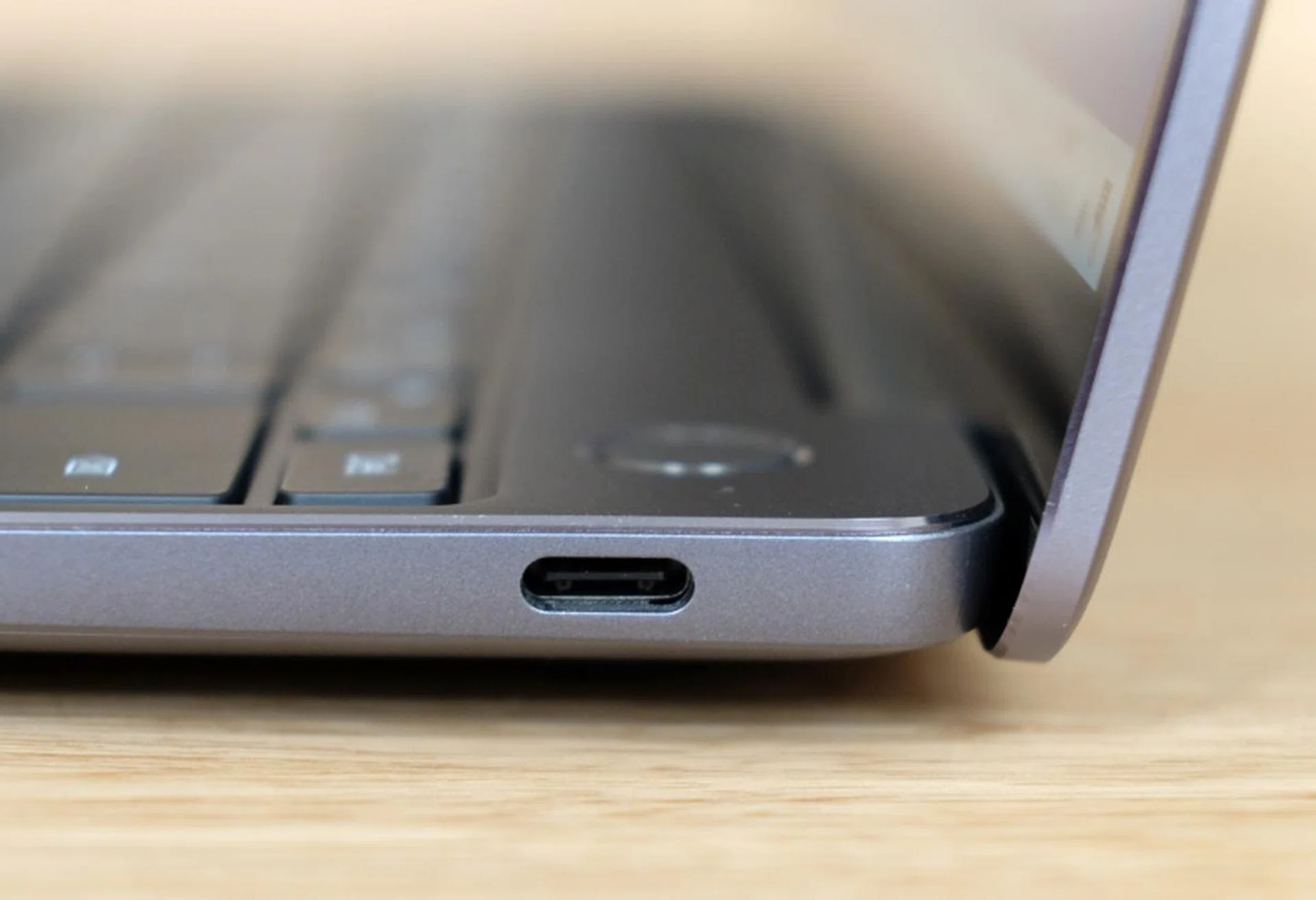 There's a single USB-C port on the left side. Unfortunately, it only supports USB 3.1 Gen 1 not Thunderbolt 3.