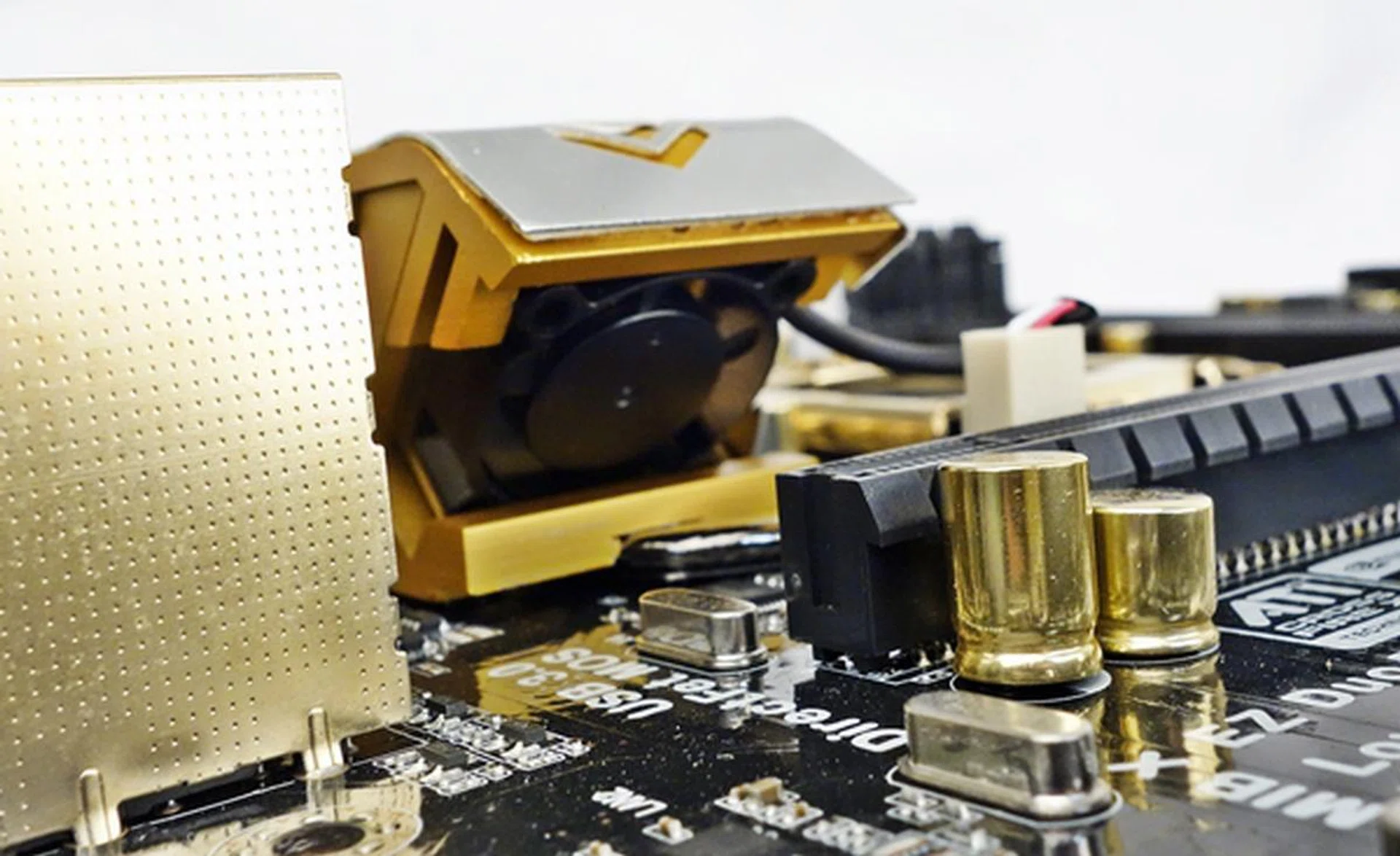 One of the VRM heatsinks has a hidden secret, a small cooling fan!