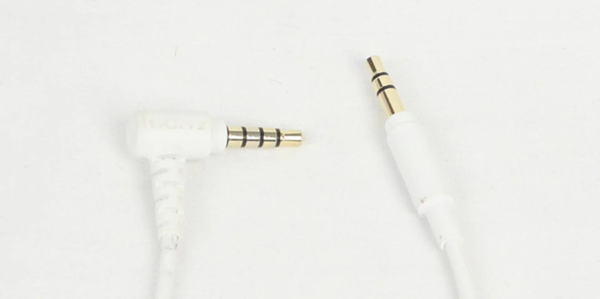 The wires of the Sony MDR-10R can be removed. The L-shaped 3.5mm connector is meant to plug into your playback device, while the straight plug goes into the headphones.