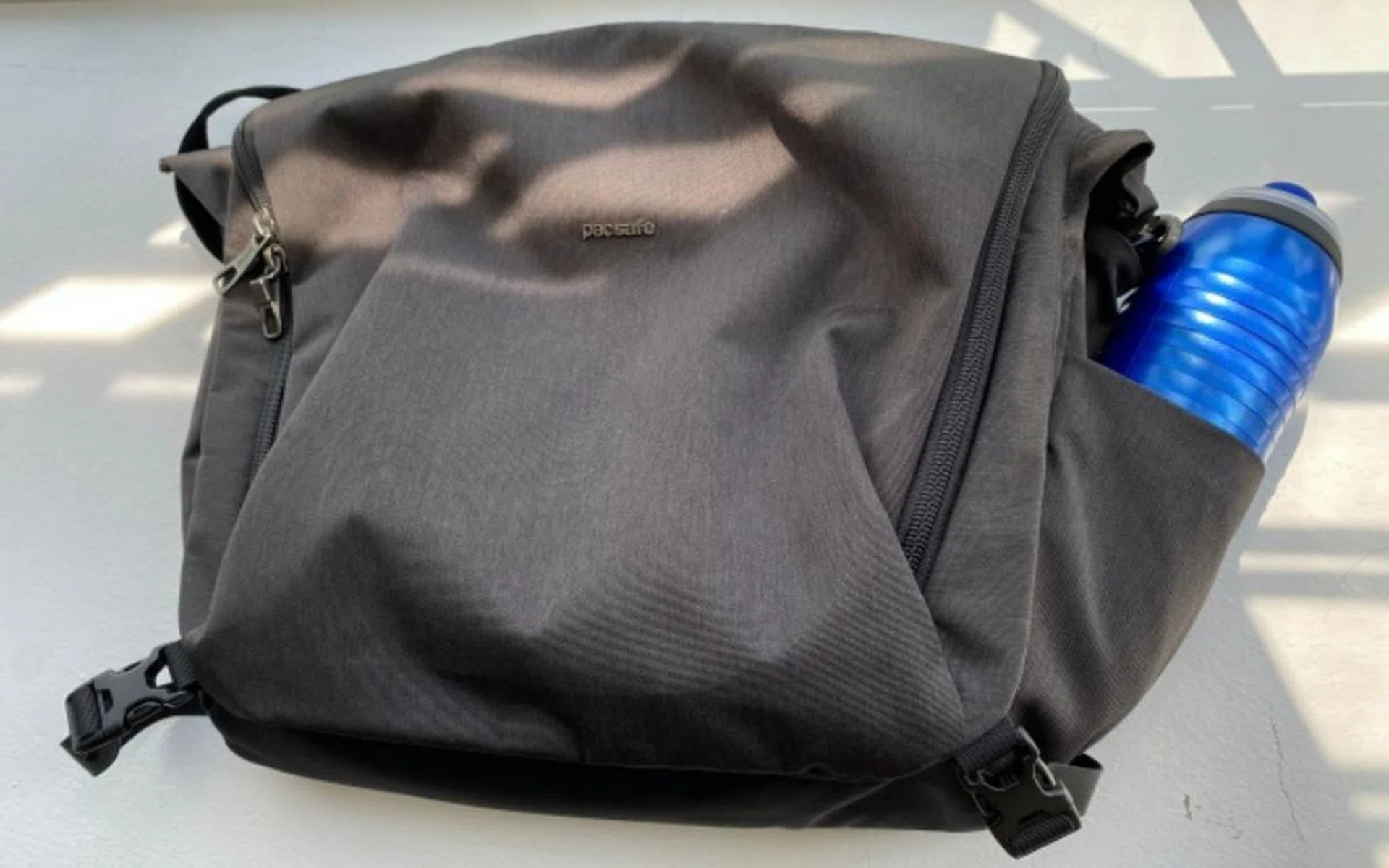 The PacSafe bag I usually use. You can see the water bottle holder on the side