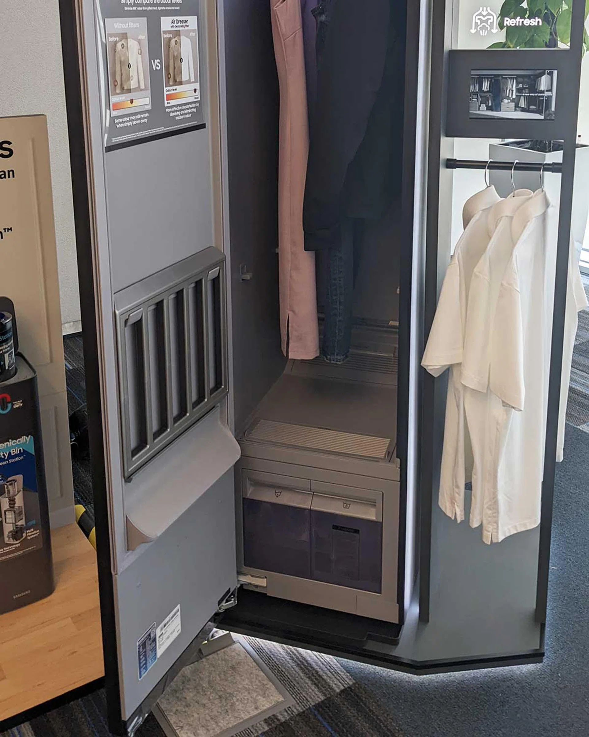 The bottom half of the AirDresser, with its water and drainage boxes. Note the tray on the left.