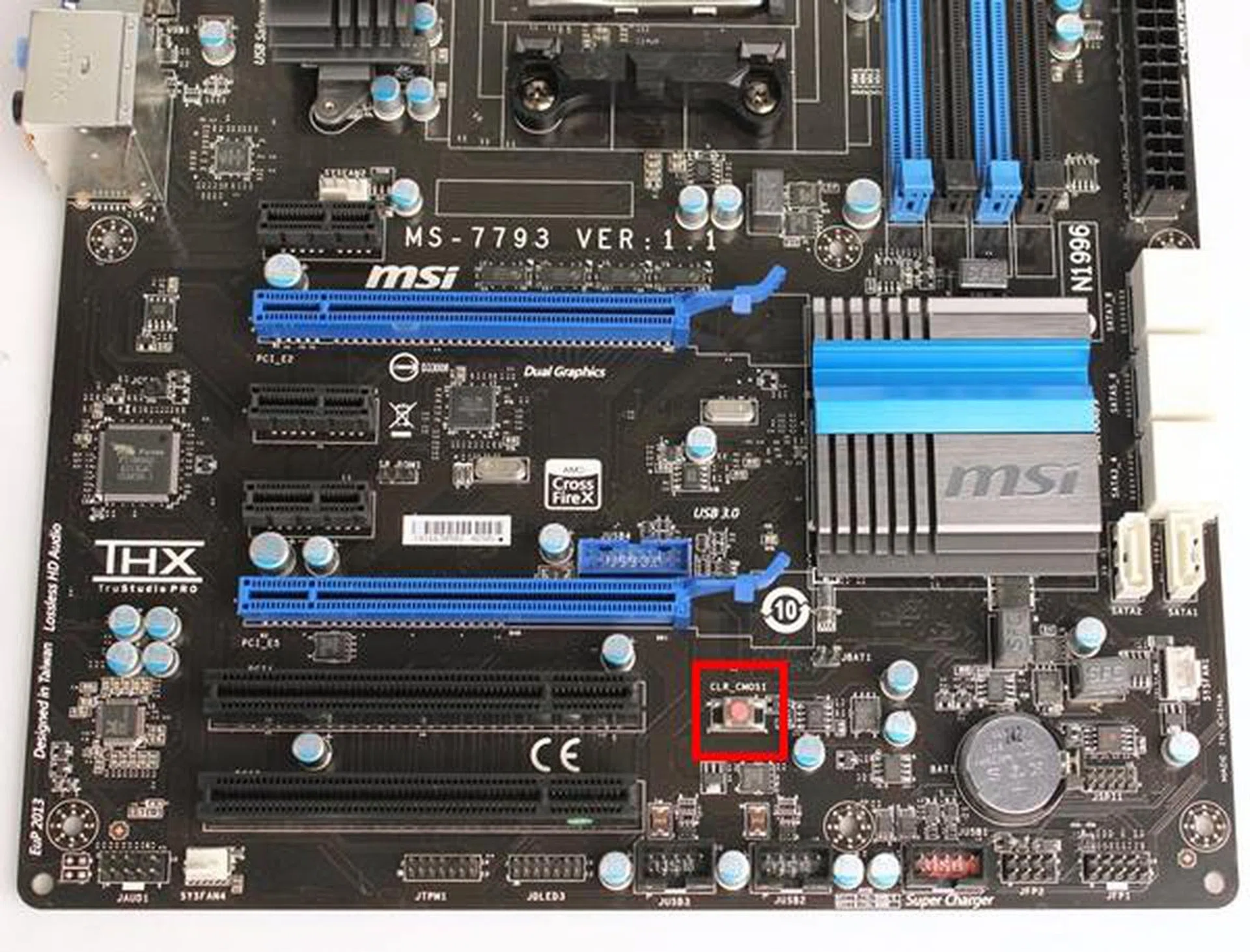 The clear CMOS button, which is the small red button highlighted in the photograph, is positioned away from the rear I/O panel so that it will not be accidentally pressed. It's a well thought placement too considering it doesn't sit in the way of the PEG slots and is behind the lesser used PCI slots. Chances are you would get a clear shot of pressing the button if required and it's no less trouble than reaching out to the back of the system in other motherboard implementations.