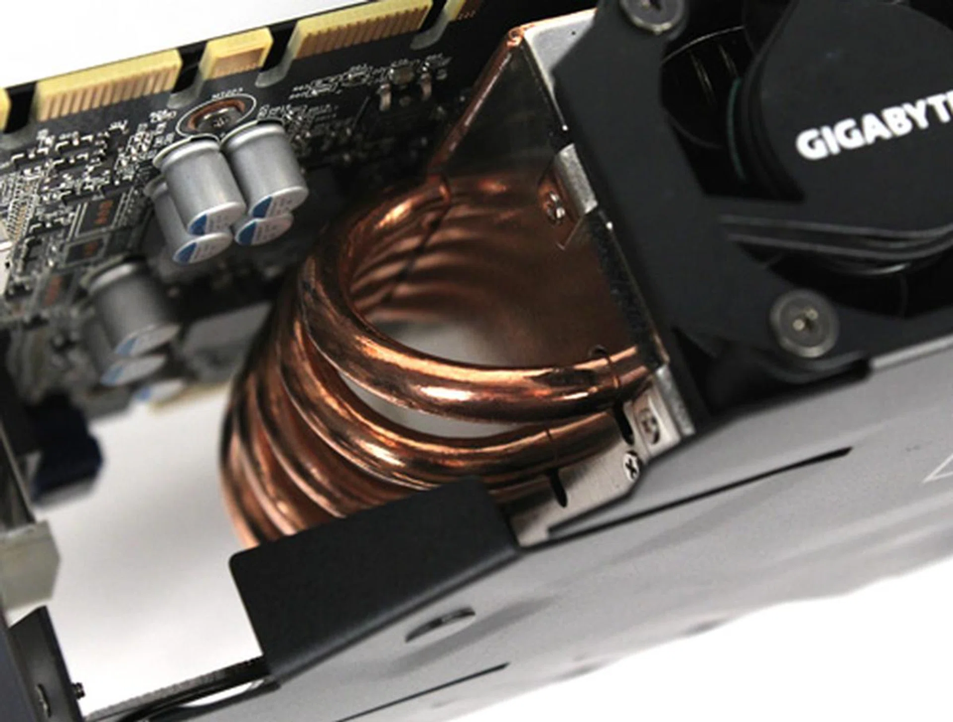 The huge heatsink uses five copper heatpipes connected to...