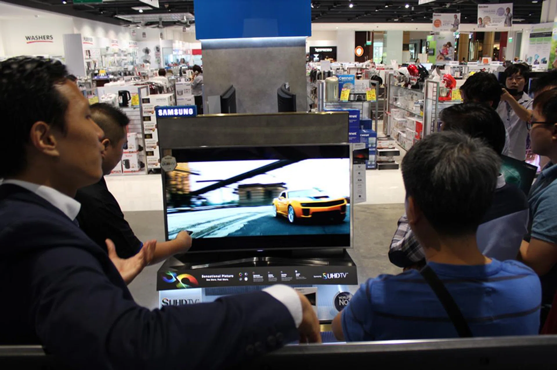 The viewing area was packed, even with the attendees taking turns to have a view at the new TVs.