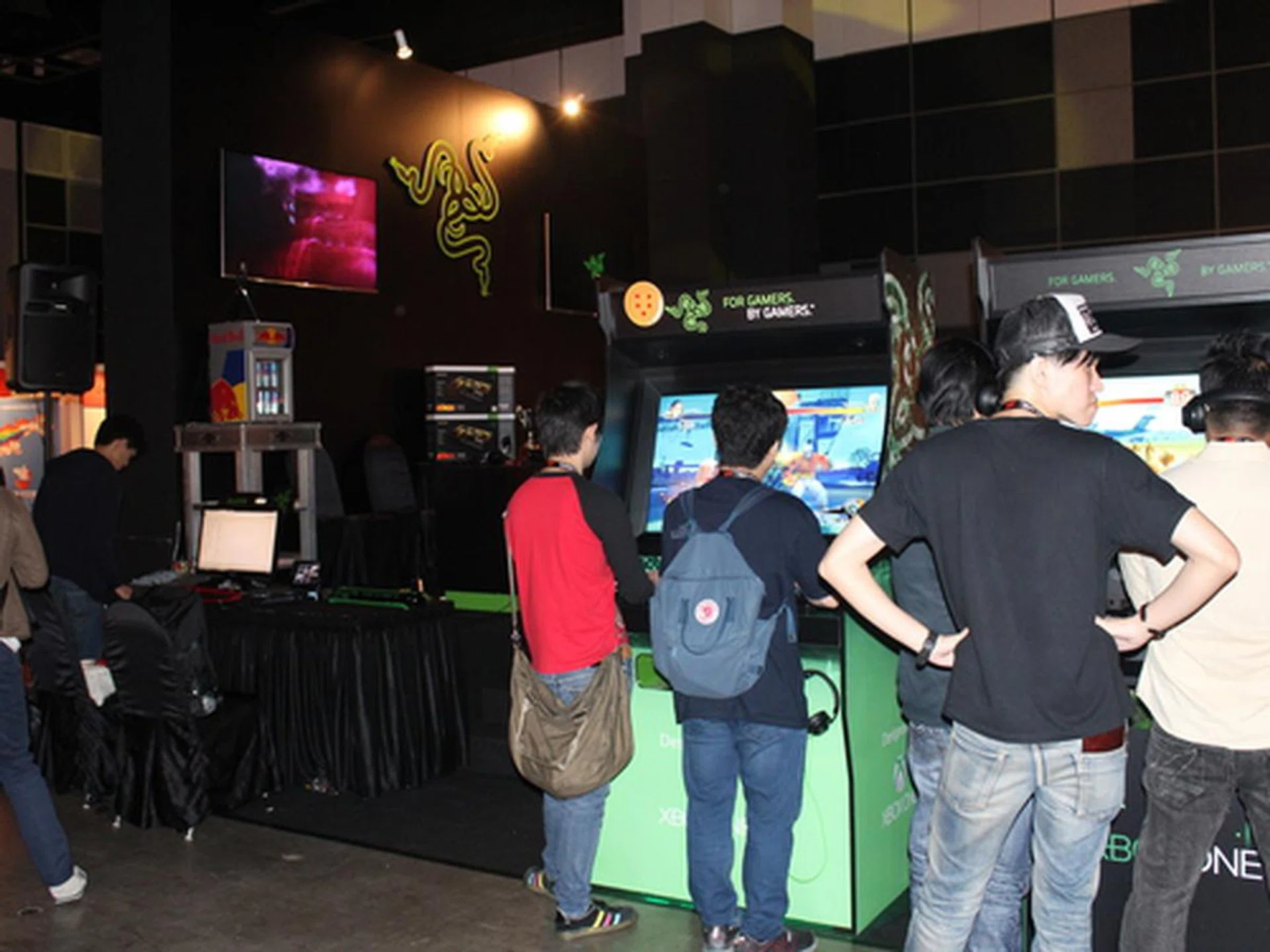 Despite Ultra Street Fighter IV being out for months, people still queued up to have a go at Razer's booth.