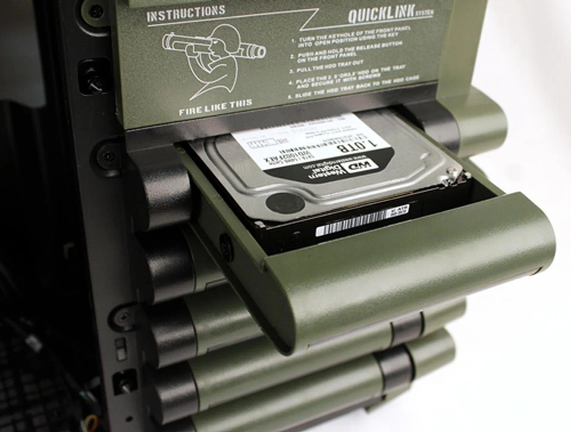Sliding in the tray with our securely installed HDD.