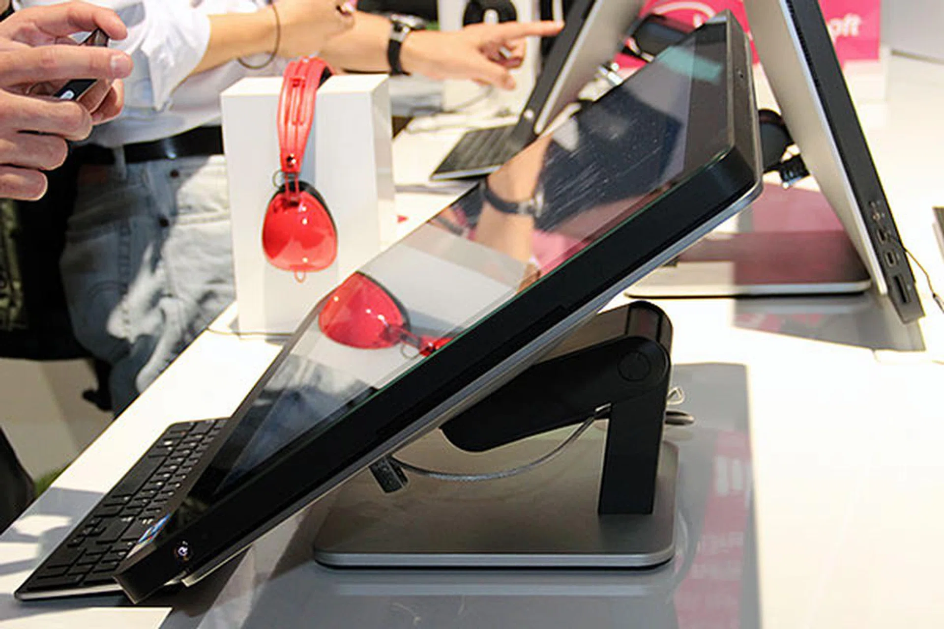 We like the XPS One 27's highly adjustable stand. If you want, you can have it lie flat on the desktop.