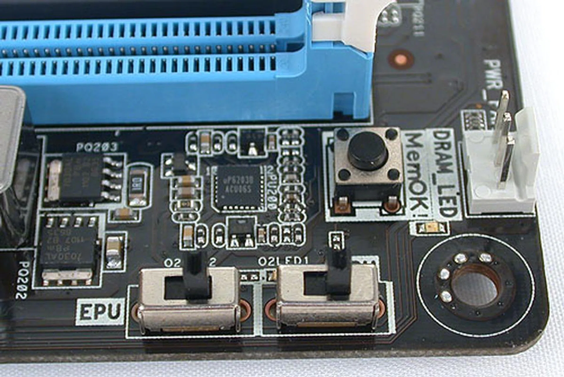 All the switches for ASUS' proprietary technologies are conveniently clustered together at one corner of the board. The location is suitable while the board is out of the case, but once it's in a more compact chassis like that of a mid-tower, this section can be hard to reach and use.