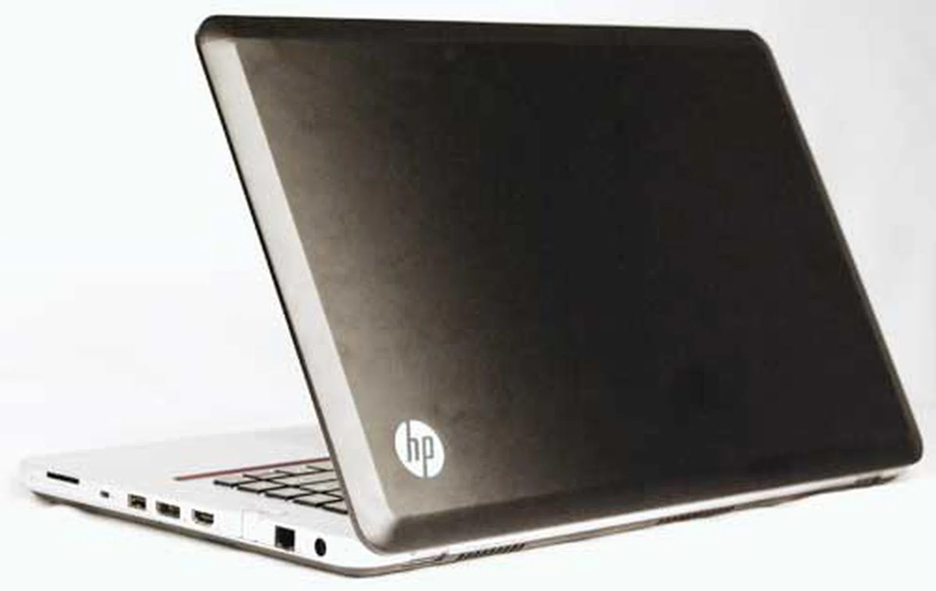 The HP Envy 15 looks like a MacBook Pro, but it's a tad curvier and has chamfered edges, making it more comfortable to hold and handle the notebook. 