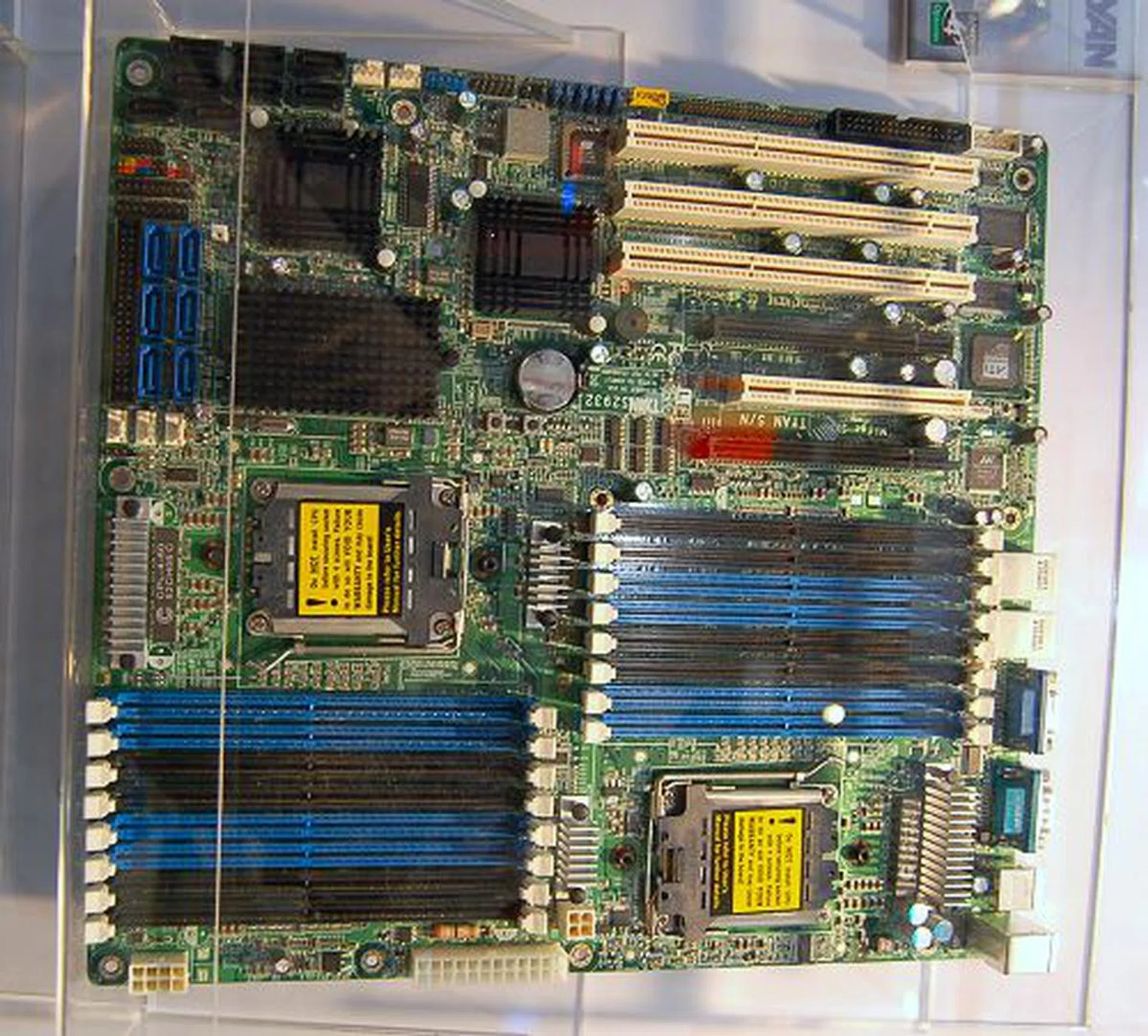  This is the Tyan Thunder n3600M motherboard built around the nForce Professional 3600 MCP with 16 DDR2 DIMM slots supporting up to 64GB of registered DDR2-667 memory. It has two PCIe x16 slots (x8 links), three PCI-X slots and a single PCI slot. The storage subsystem is impressive with six SATA 3Gbps ports (with RAID) and eight SAS connectors also supporting RAID. Dual Gigabit LAN ports and an ATI ES1000 graphics controller (with 32MB RAM) round up the main features of this board.  