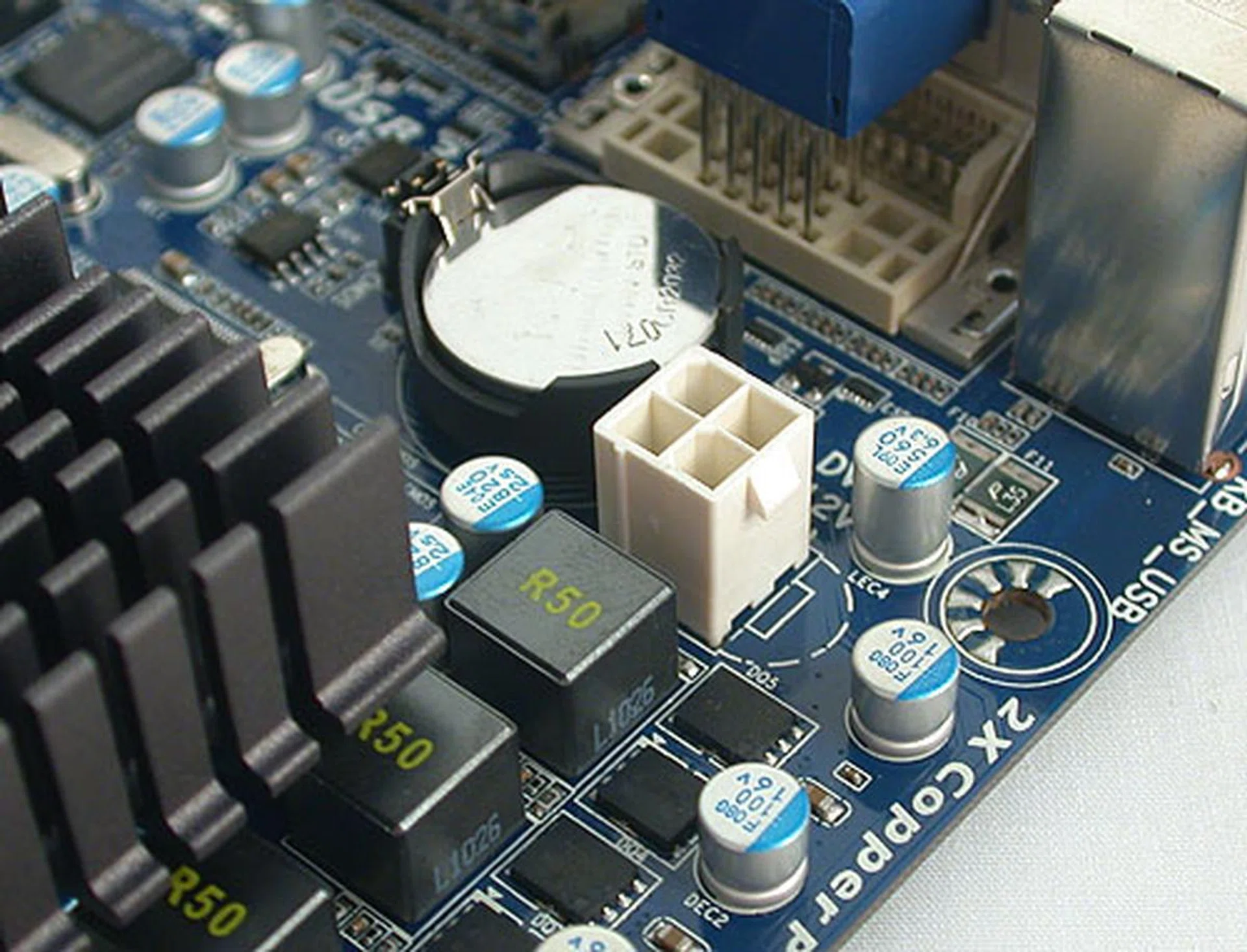 Again, unlike the ASRock, a 4-pin ATX power connector is located on the Gigabyte in addition to the 24-pin connector. 