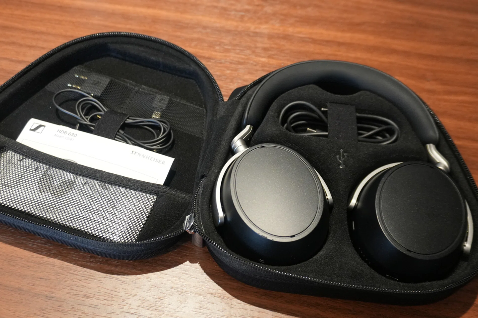 The Sennheiser HDB 630 comes along with the BTD 700 transmitter, an USB-C charging cable, a 2.5mm to 3.5mm cable, and an airline adapter. 