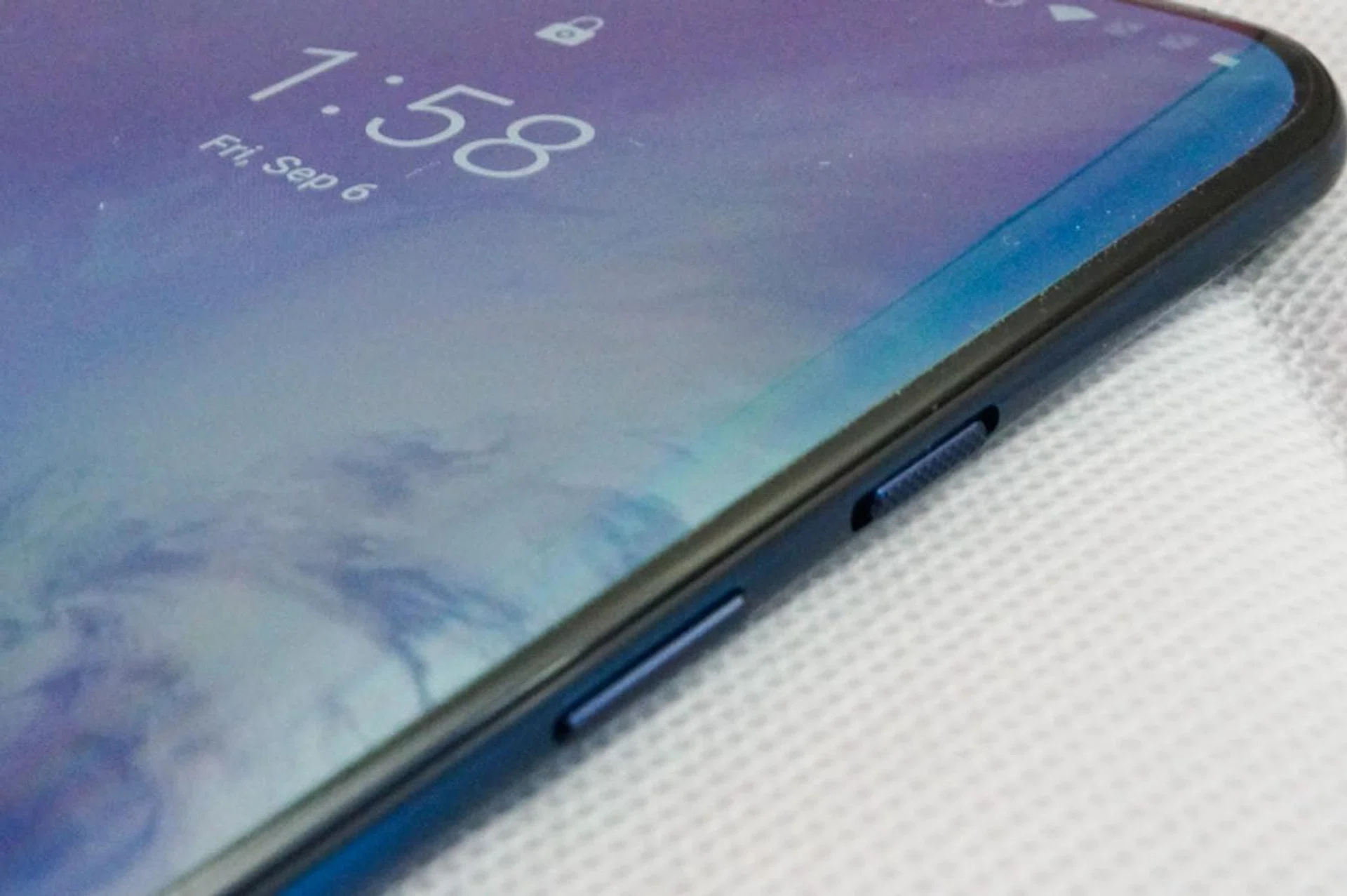 The slider lets you quickly switch between silent mode, loud mode, and vibration only mode.