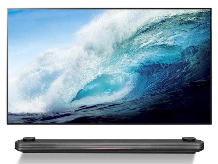 The 65-inch LG Signature OLED TV W panel is wallpaper thin, measuring only 2.57mm (equivalent to two S$1 coins stacked together).