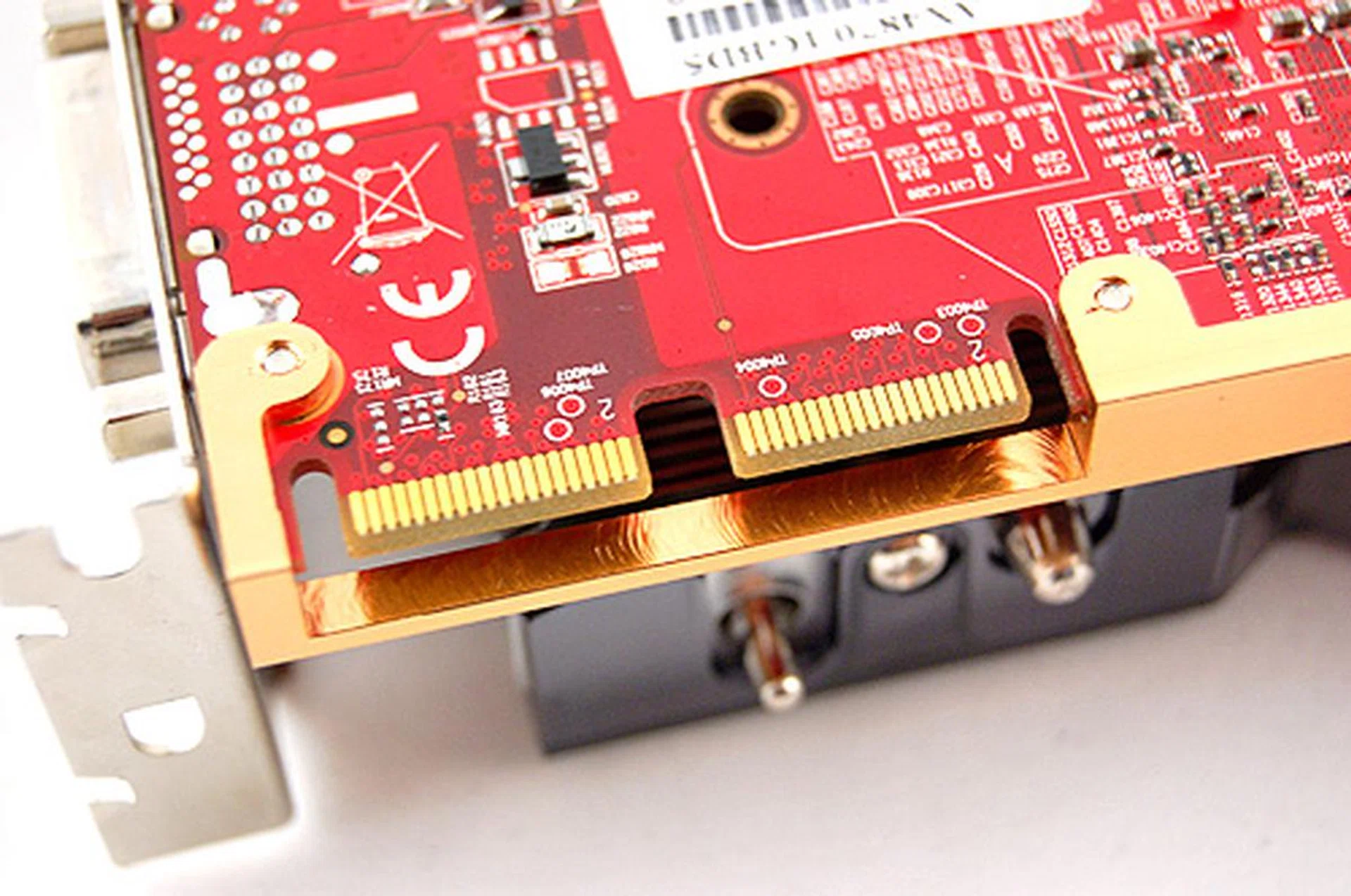 The PowerColor PCS+ HD 4870 comes with two CrossFire connectors, which means up to four 4870 cards can be linked, but only if your motherboard is capable of such a configuration.