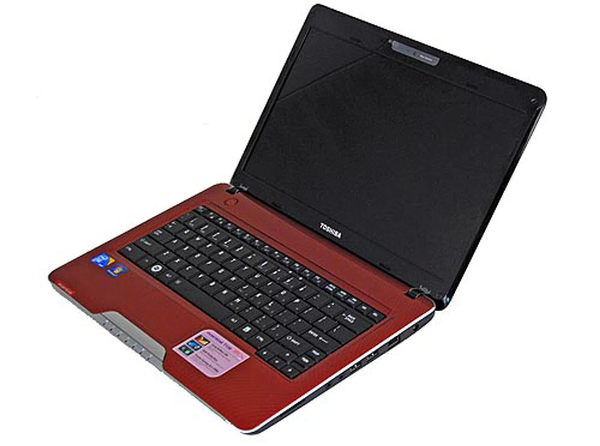 The interior reveals yet more gloss from the screen down to the keyboard and palm rest.