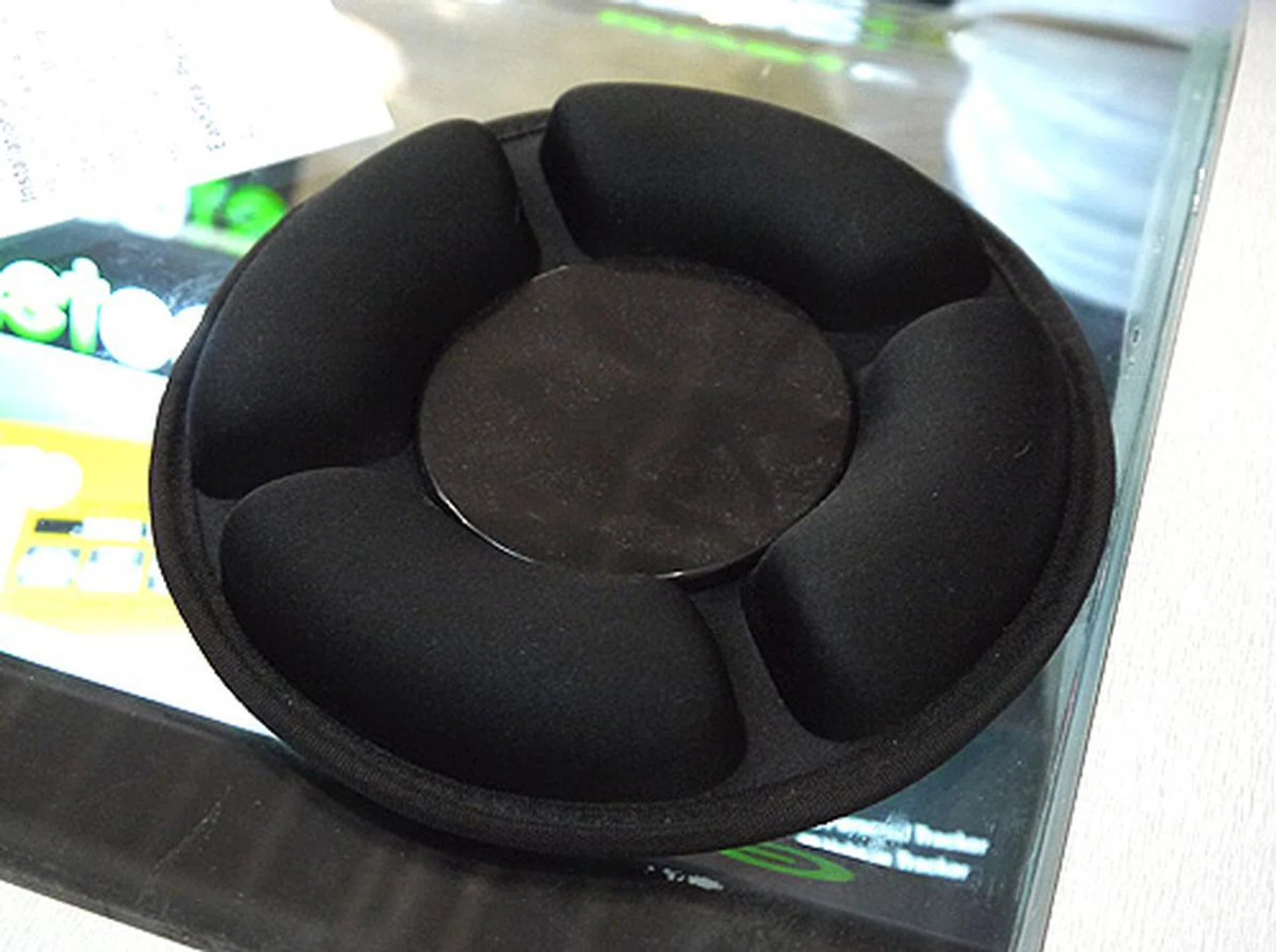 If you find that the suction mount of your GPS holder is not up to task, why not consider this humongous dashboard friction mount. It has a super sticky and grippy silicon base so you don't have to deal with messy stickers. Going for $15.