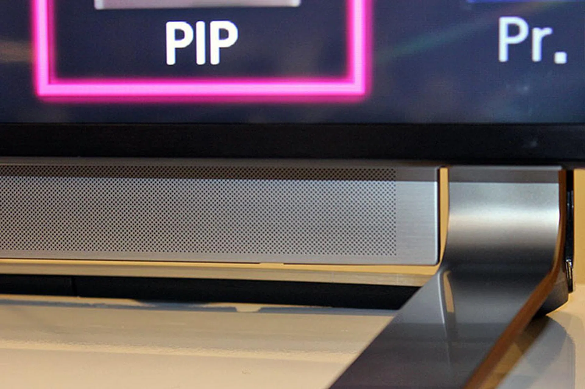 Instead of downwards-firing speakers, the LA9700 4K UHDTVs have front-firing 4.1-channel speakers that slide out when in use, and back into the cabinet when turned off.