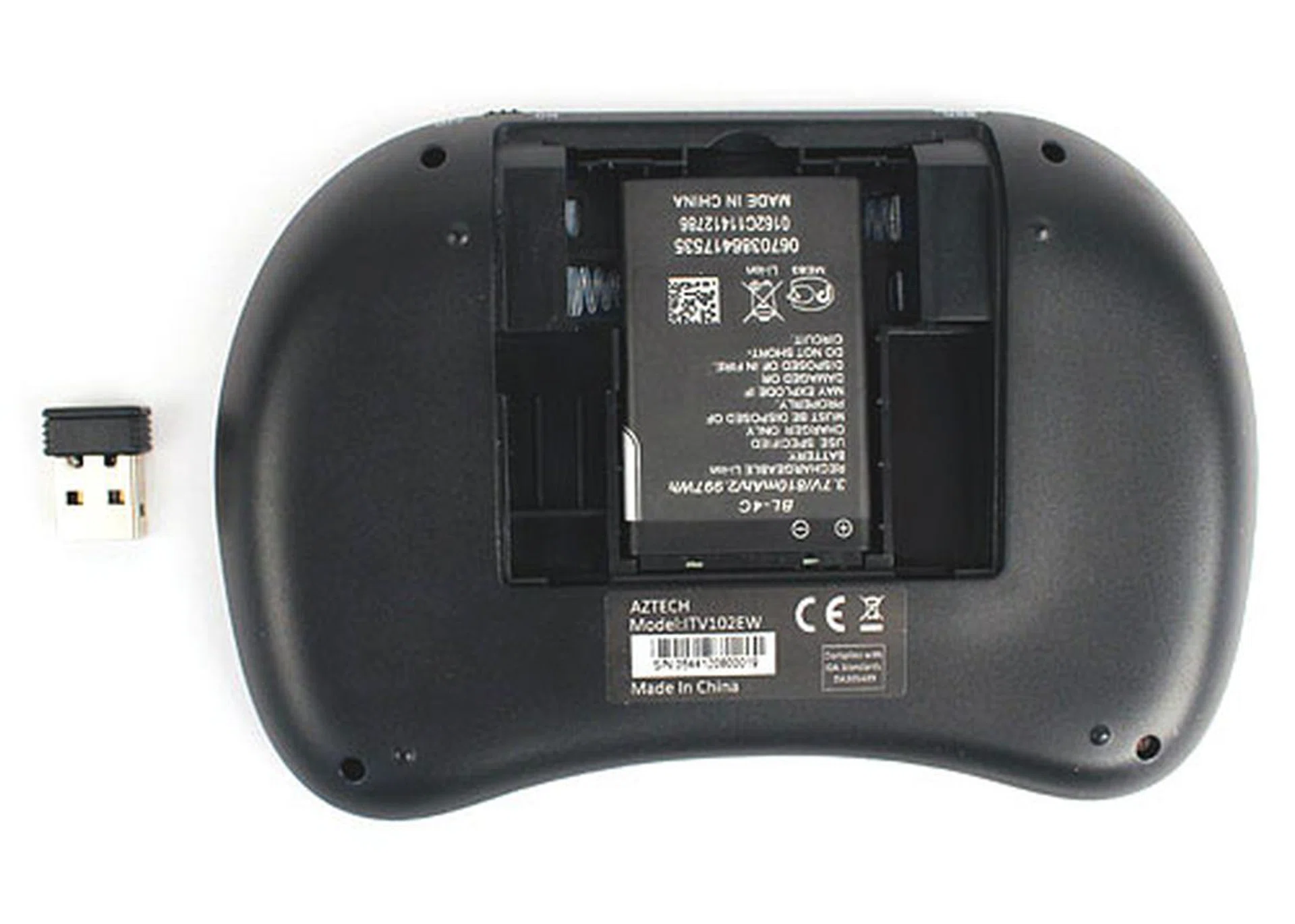 The USB transceiver can be stored in the remote, right beside the battery when not in use. It has to be plugged into the player for the remote to wirelessly communicate with the player.