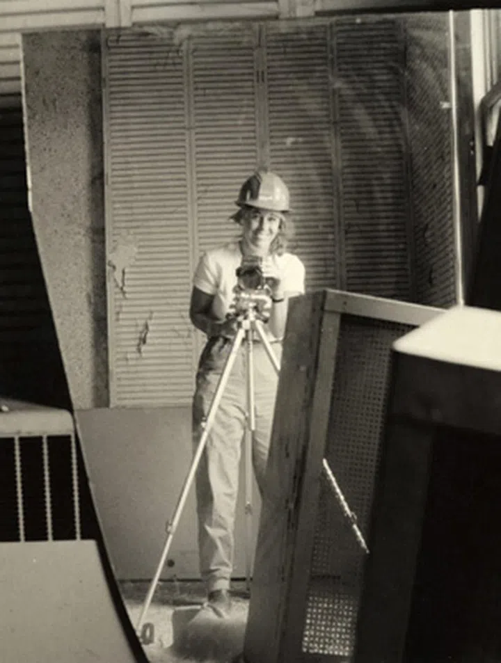 Carol Highsmith self-portrait in a broken mirror that she photographed during the Willard Hotel restoration, Washington, DC (c. 1980–90) (image via Wikimedia Commons)