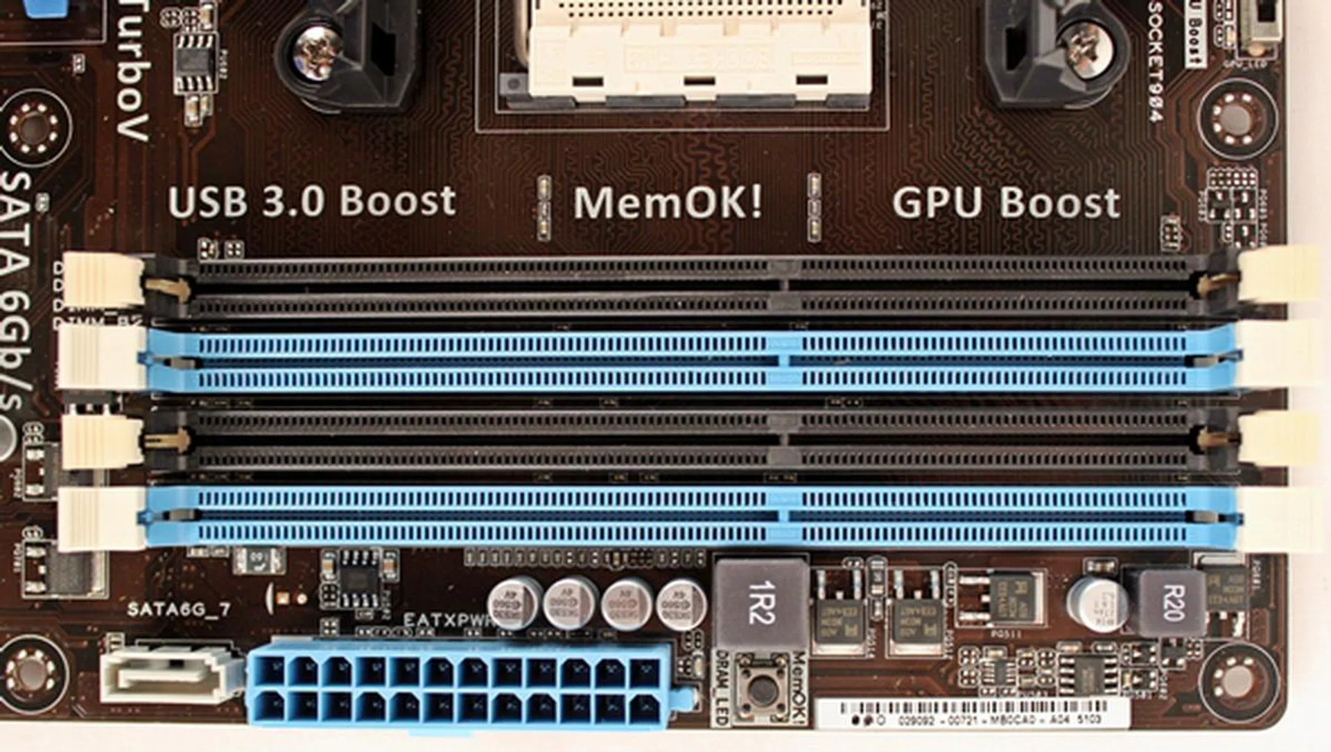 To the right of the FM2 socket, we see the color-denoted DIMM slots that are capable of supporting DDR3-2400+ memory modules, up to a maximum capacity of 64GB.