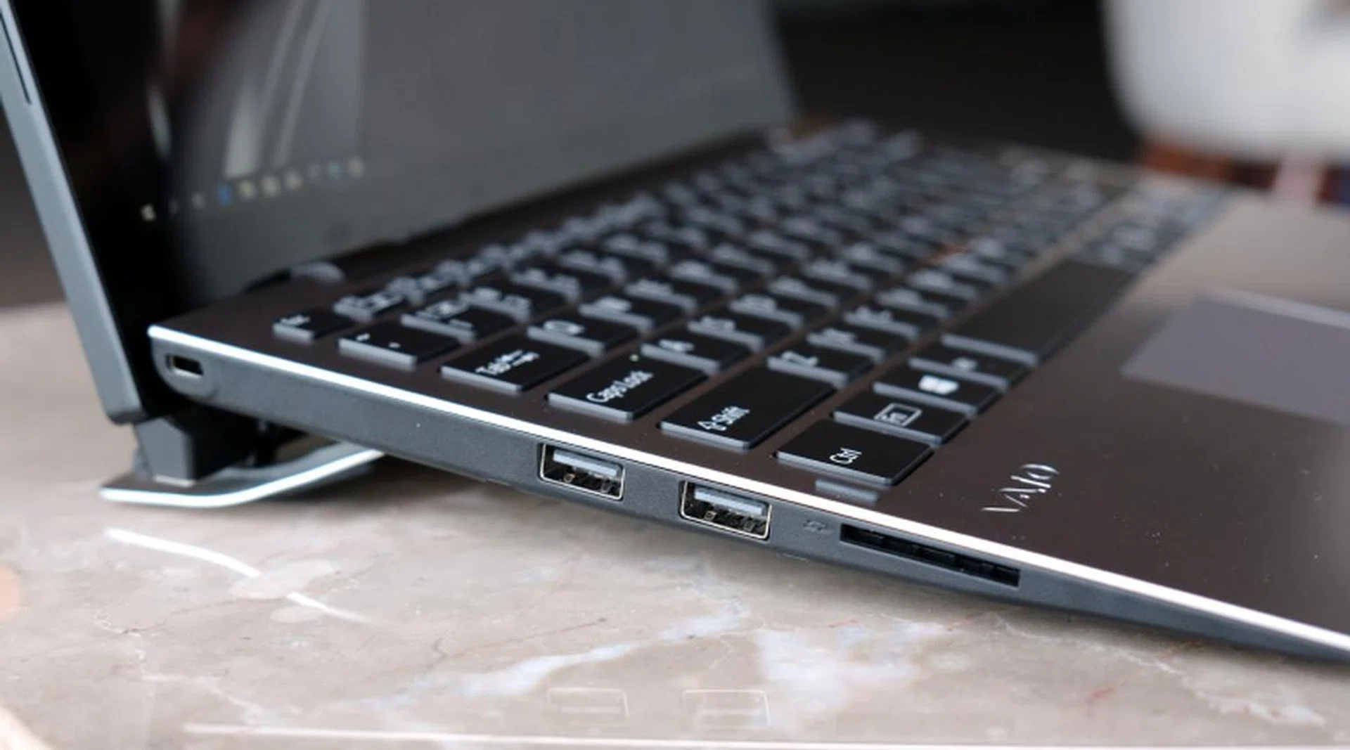 There are more ports on the left. Here, we have two USB-A (USB 2.0) ports and an SD card reader.