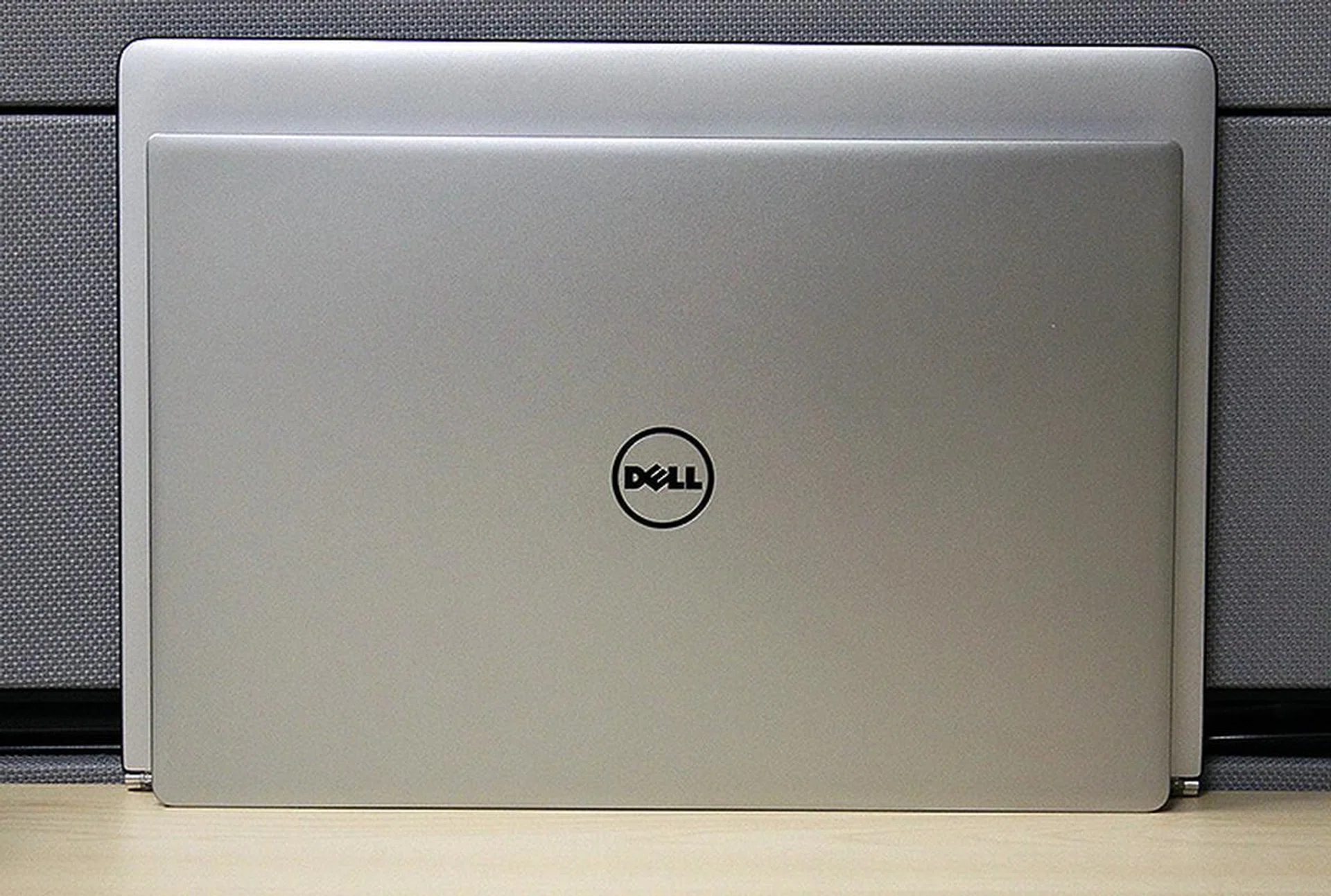 Here is the Dell XPS 13 in front of the Lenovo Yoga 3 Pro, which also has a 13.3-inch display. The XPS 13 is a good 20% smaller.