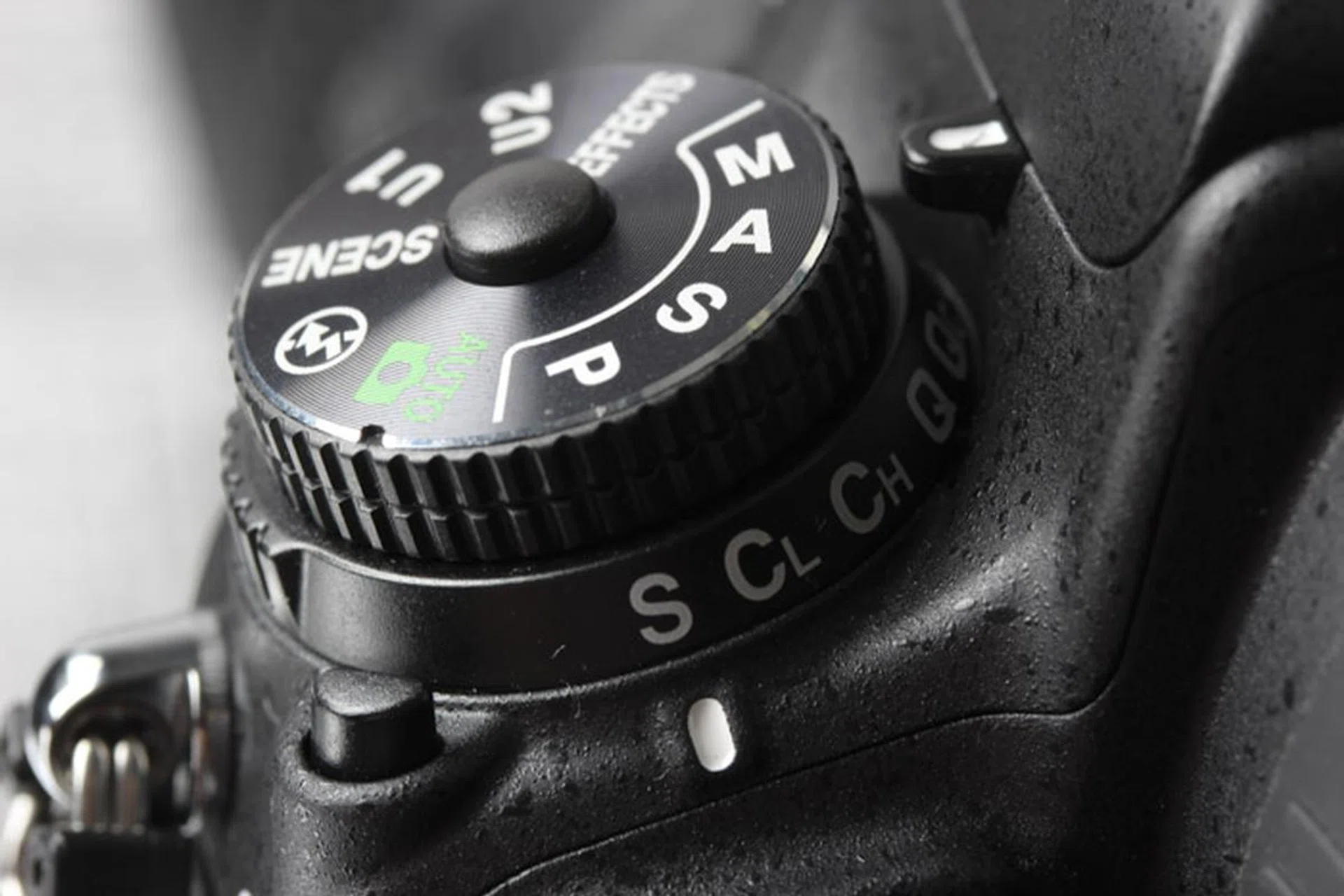 We really feel that lock button would be easier to depress if it were placed in the front of the dial.
