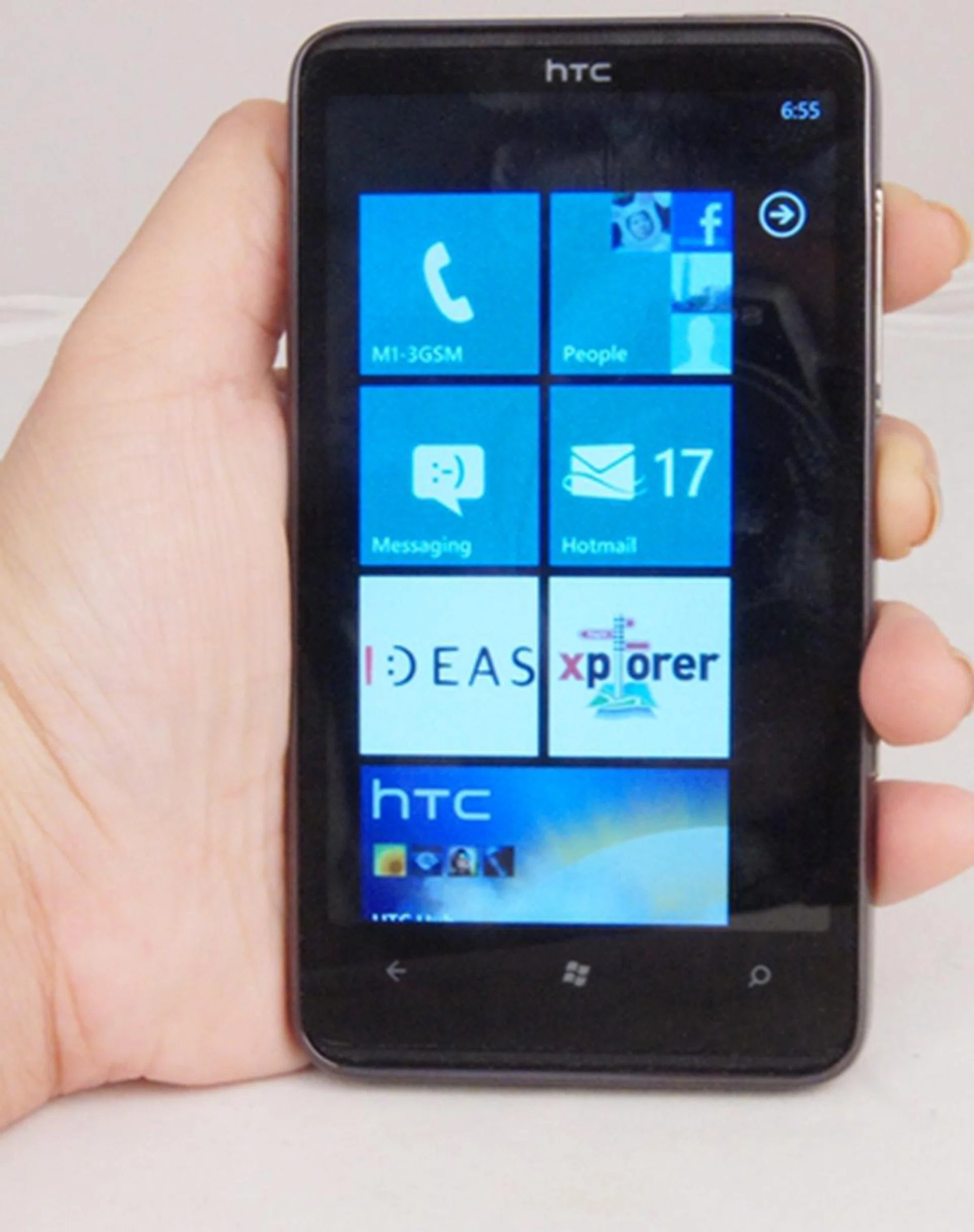 The HTC HD7 looking smart with a streamlined button layout and a clean Windows Phone 7 interface.