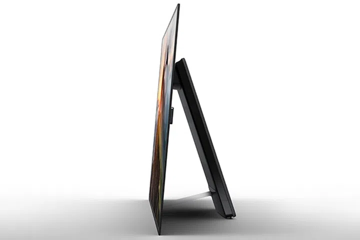 You won't see any speakers (because there aren't any) or what props up the TV from the front.