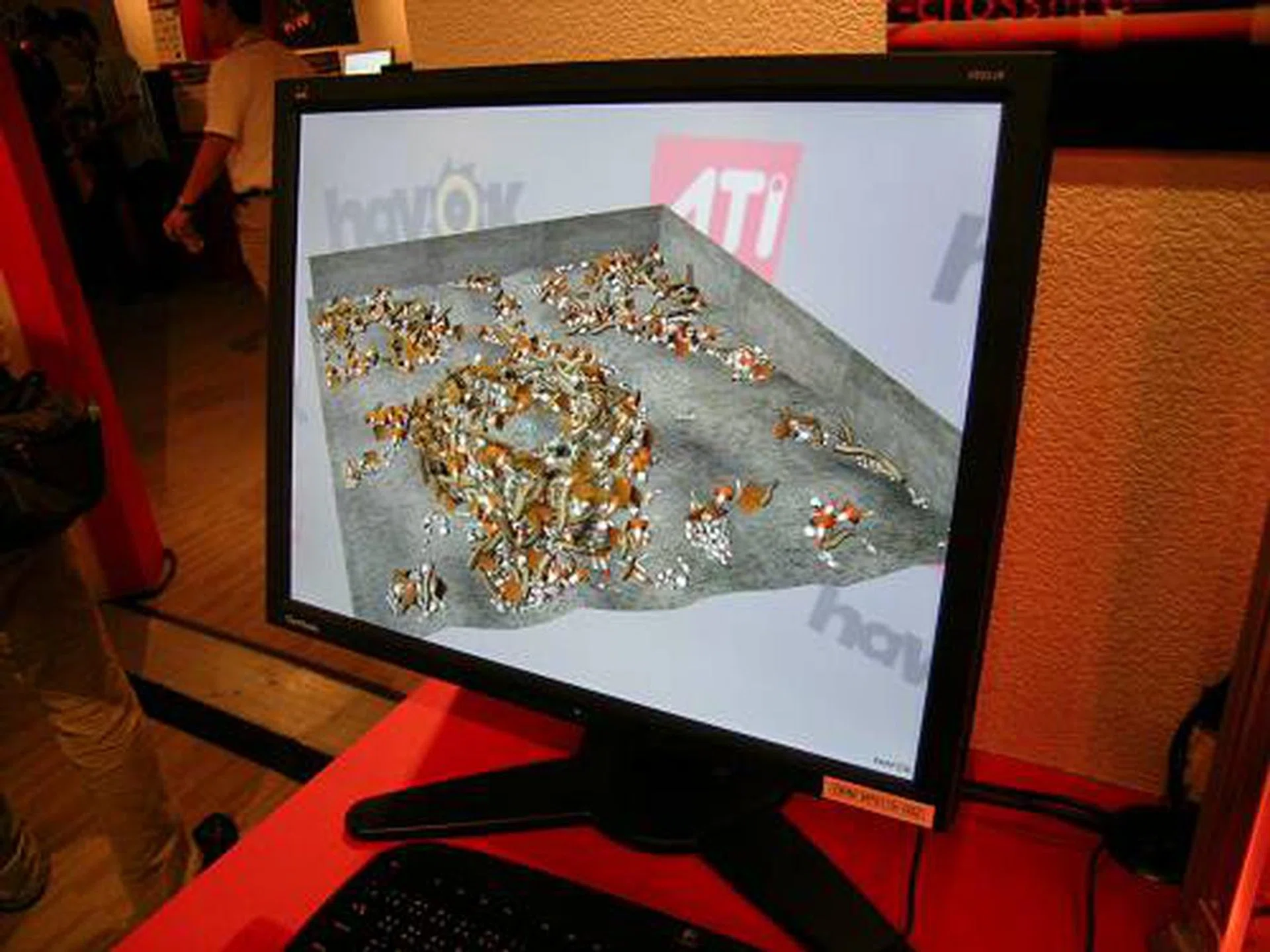 At the moment, ATI has only demoed rigid body collision and particle physics and will soon develop other physics processing as well like fluid dynamics. Running purely off CPU processing on the latest Core 2 Duo would average 10 frames or less, but with GPU physics turned on, we were looking at over 100fps peak. Of course, ATI's GPU physics is also tied in with the Havok API.