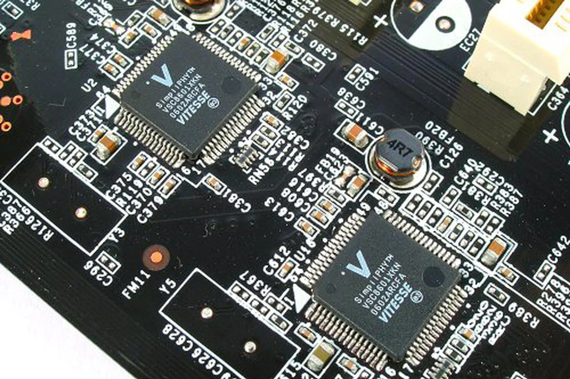 Dual Gigabit LAN isn't such a big feat these days, that is until you realize that both these chips are PHYs, which mean that the board features two Gigabit MACs in the nForce 570 SLI MCP itself.