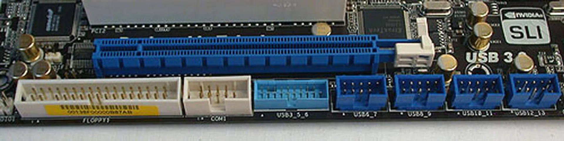 ASRock is not yet closing the door on older interfaces, as we found headers for COM and floppy ports. There are also plenty of headers for USB.