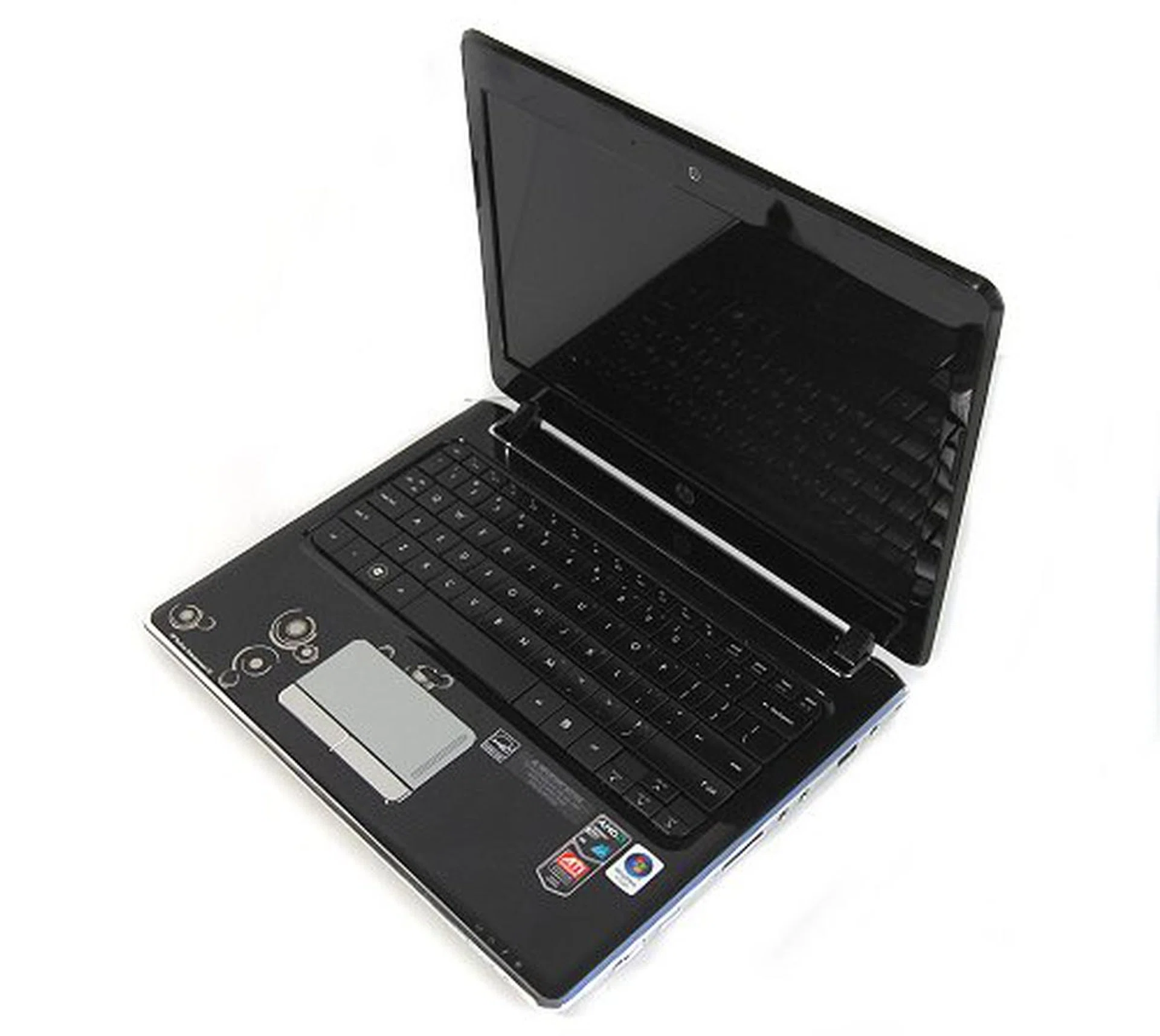 The insides reveal a very clean and neat layout, with just the keyboard and the large trackpad on the base.