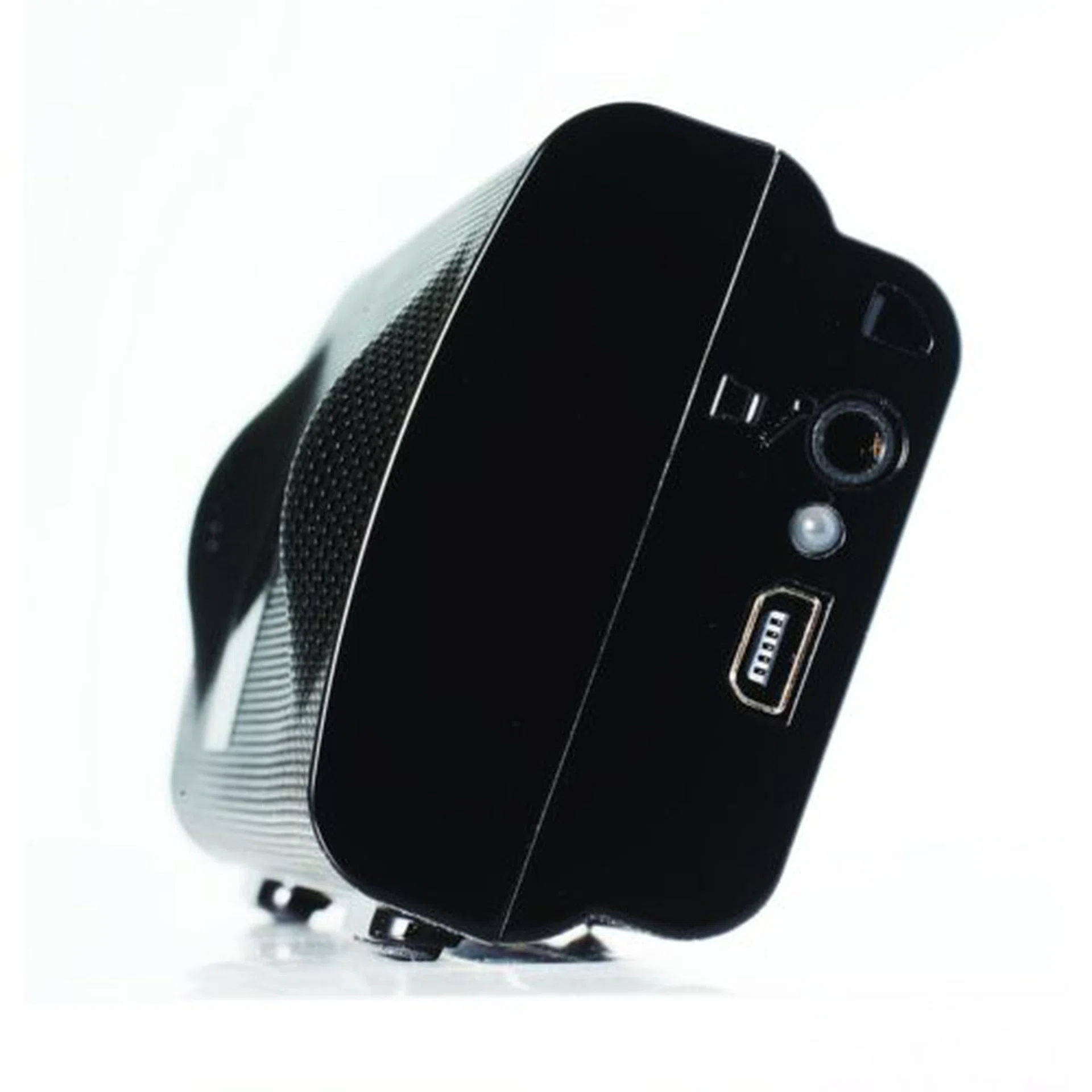 The right hand side houses a 3.5mm stereo mini-jack to hook up with an external subwoofer, a mini-USB input for an alternative power source and an LED light to indicate whether the device is powered or is in a charging state.