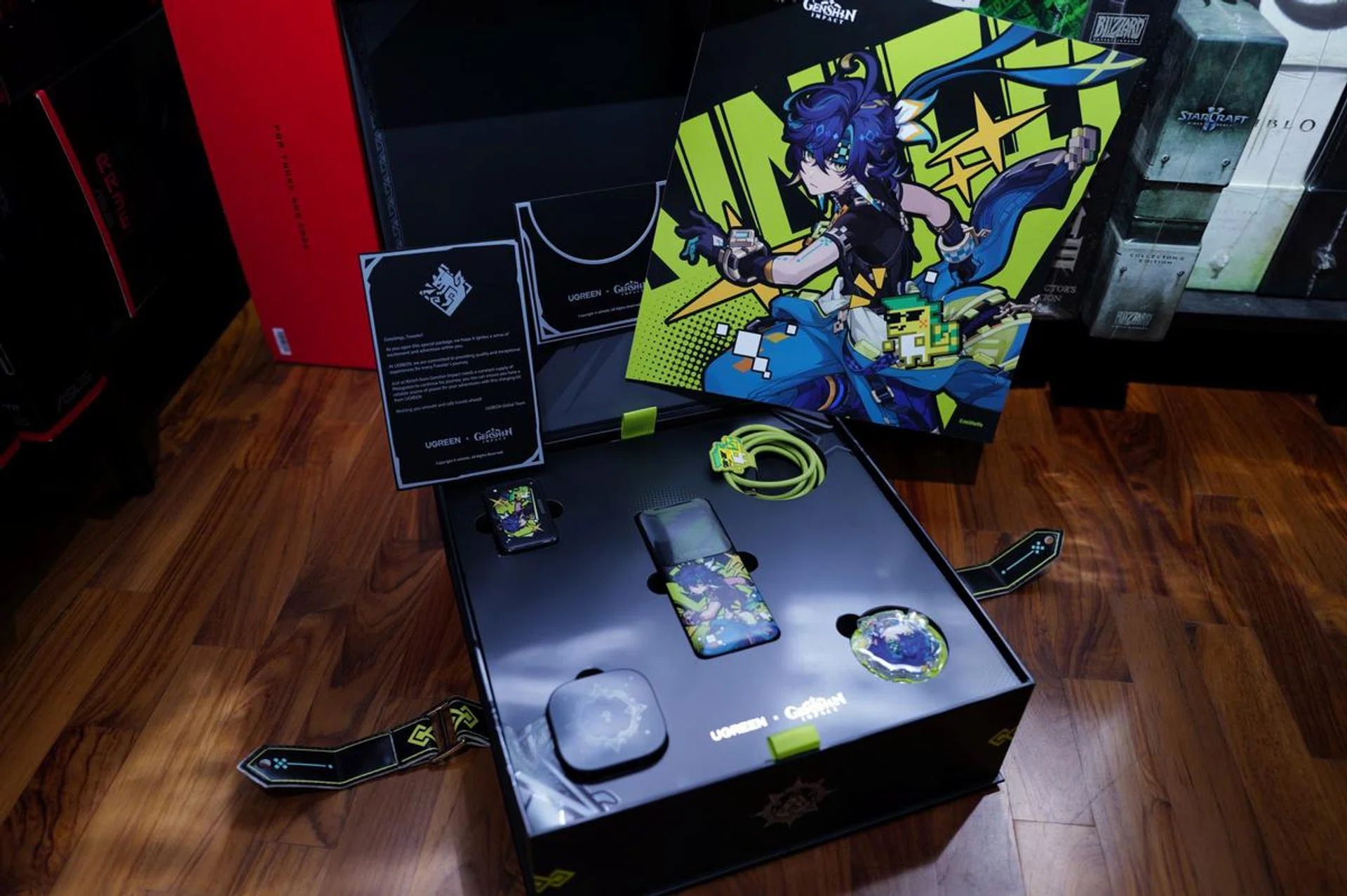 The first layer of the collectible gift box contains the key Ugreen X Genshin Impact products. Photo: HWZ