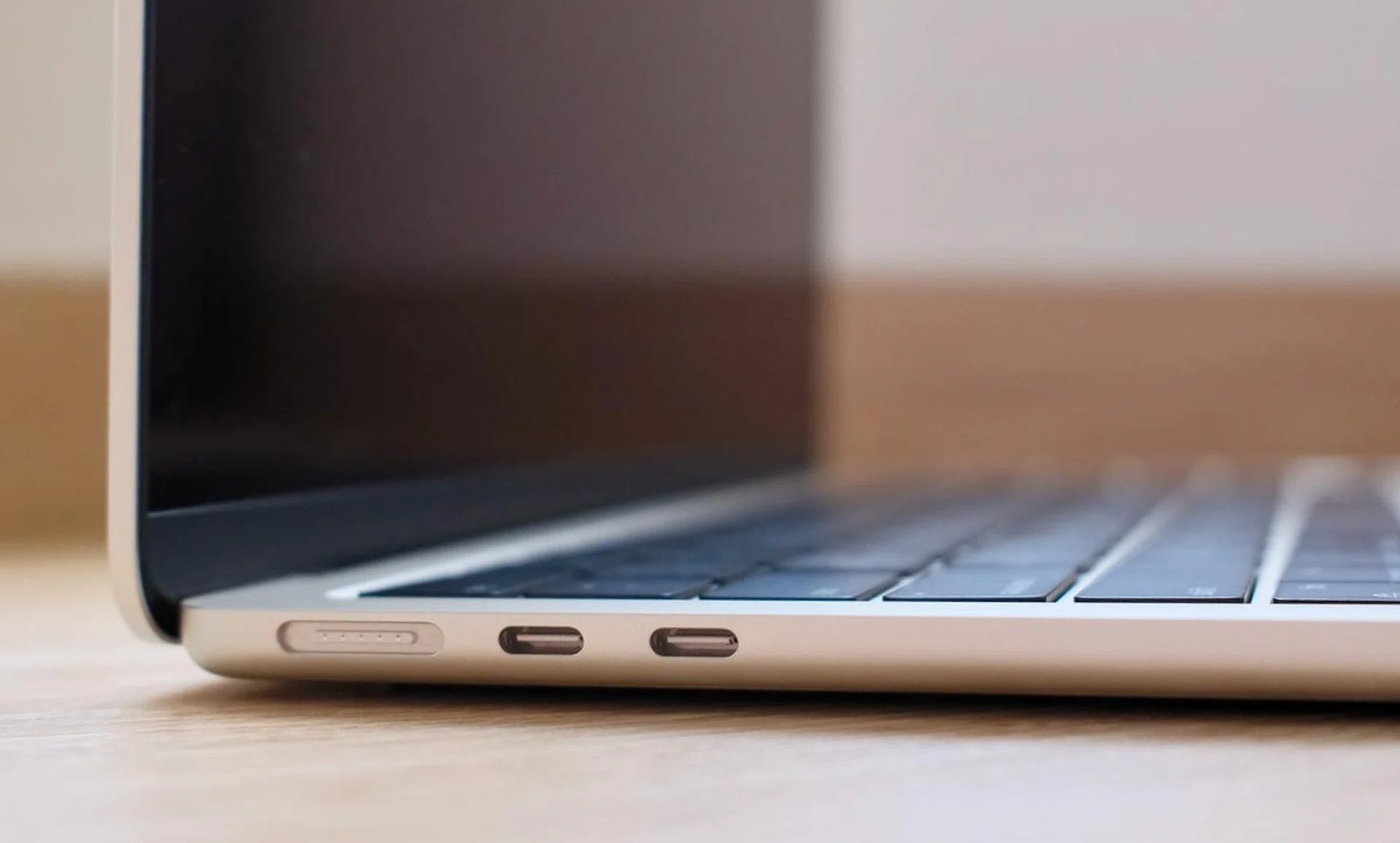 Ports are unchanged. You have a MagSafe port for power and two USB-C Thunderbolt 3 ports. Note also how thin it is.